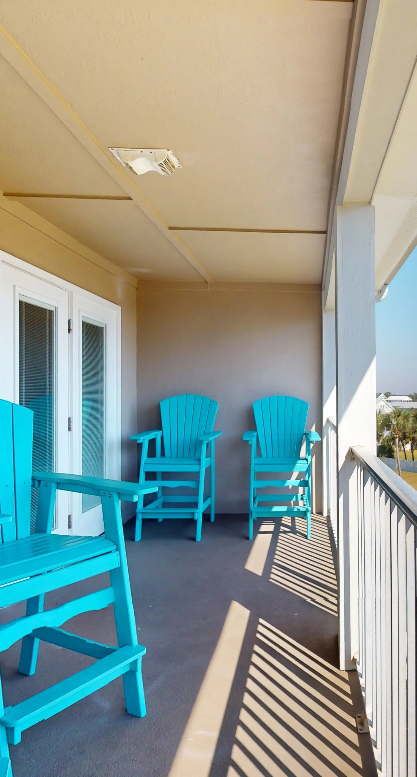 Airy coastal condo steps to the Gulf & quick drive to entertainment