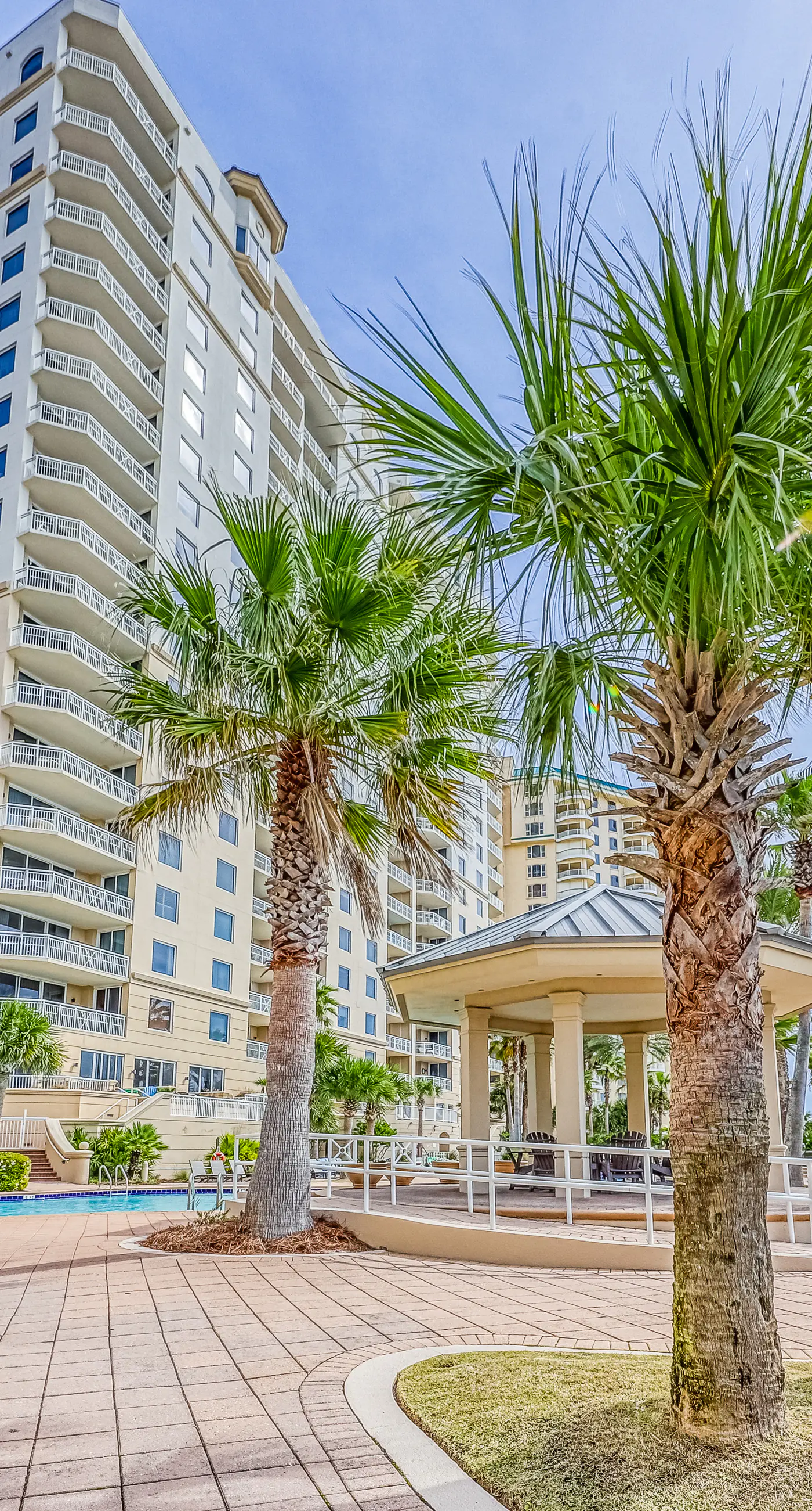 Gulf-front condo with views, pools, a hot tub, and tennis