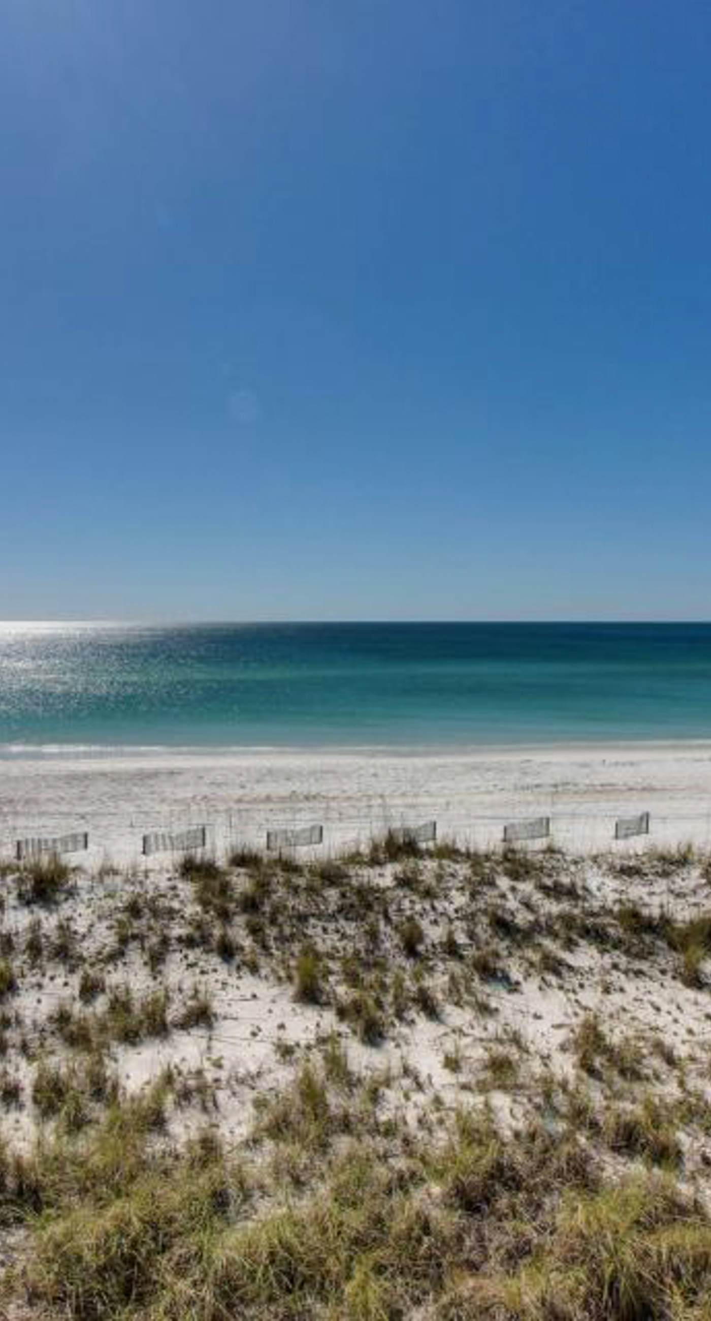 Cozy, top-floor beachfront condo with pool, pool spa, & beach access