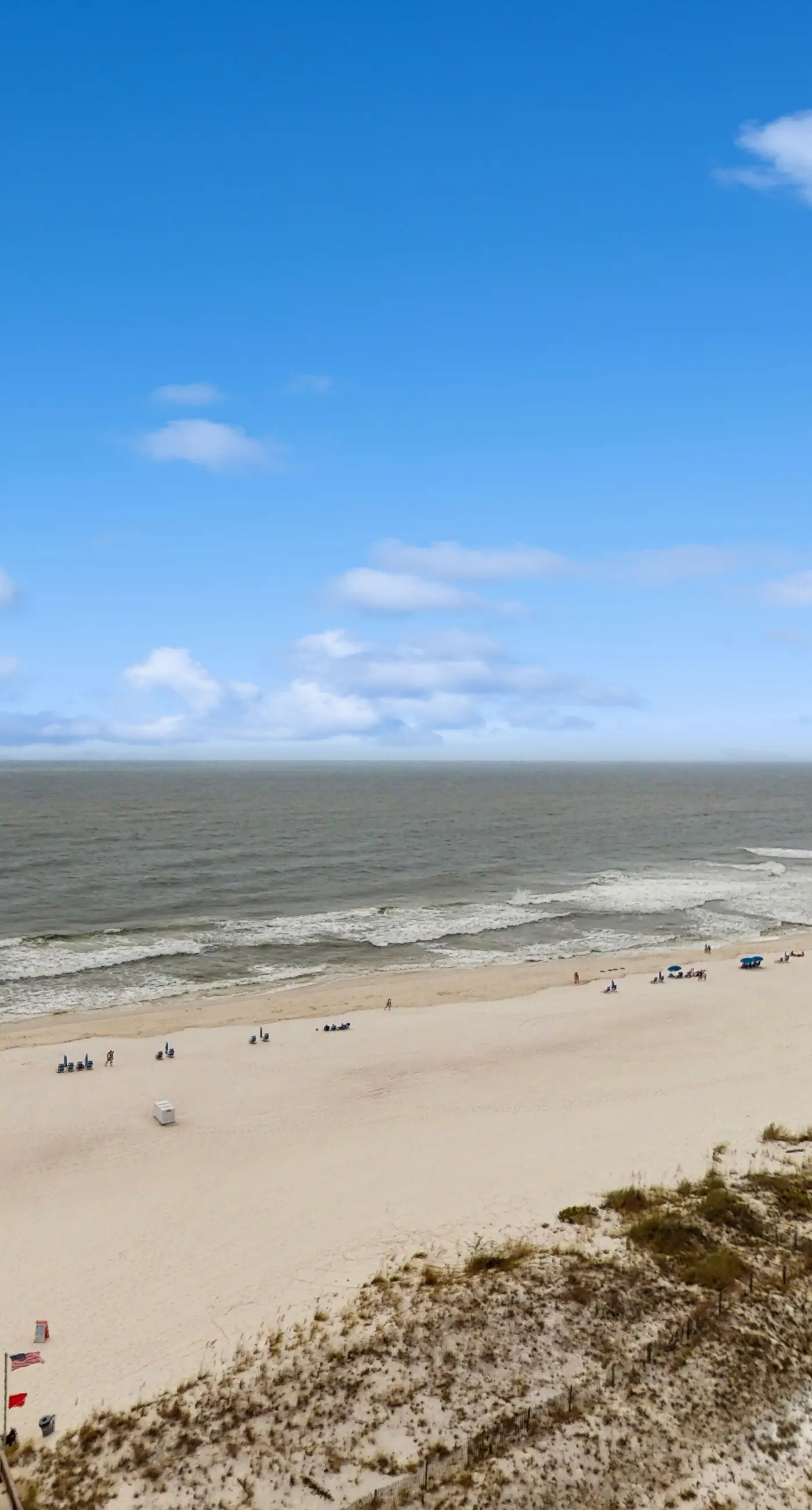 Beachfront 10th-floor condo with Gulf view, pool, gym, & balcony