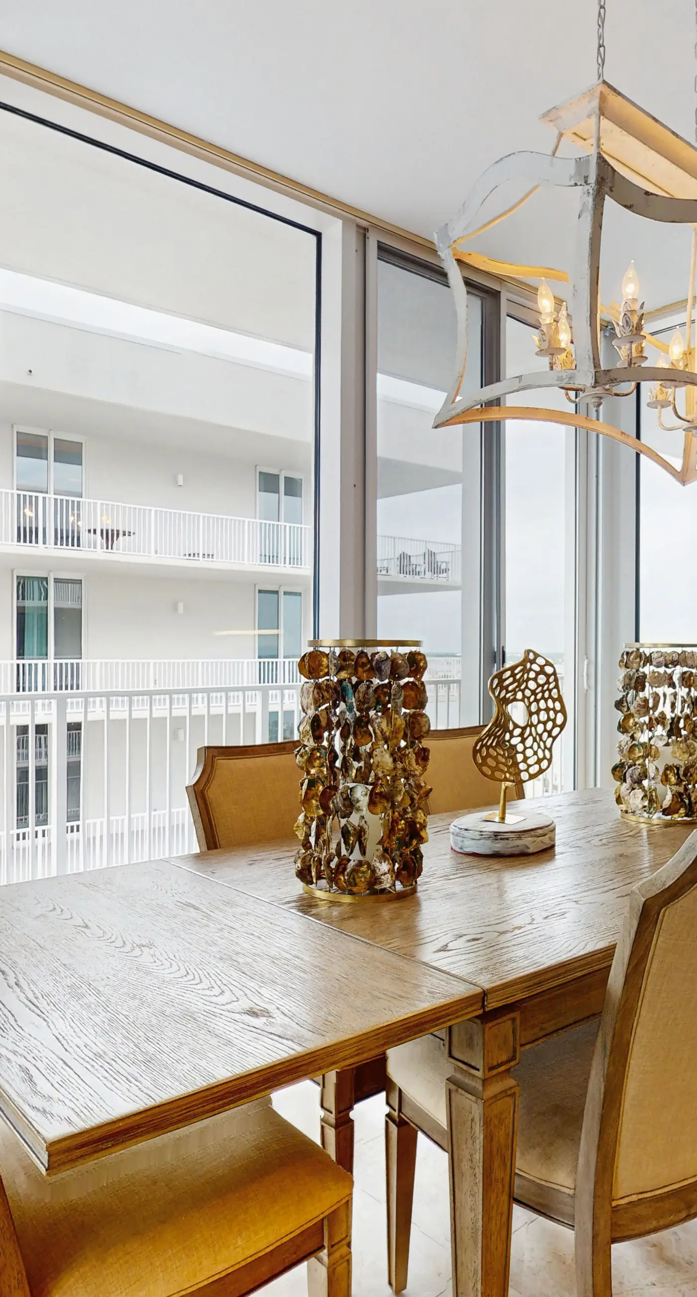 Beachfront 10th-floor condo with Gulf view, pool, gym, & balcony