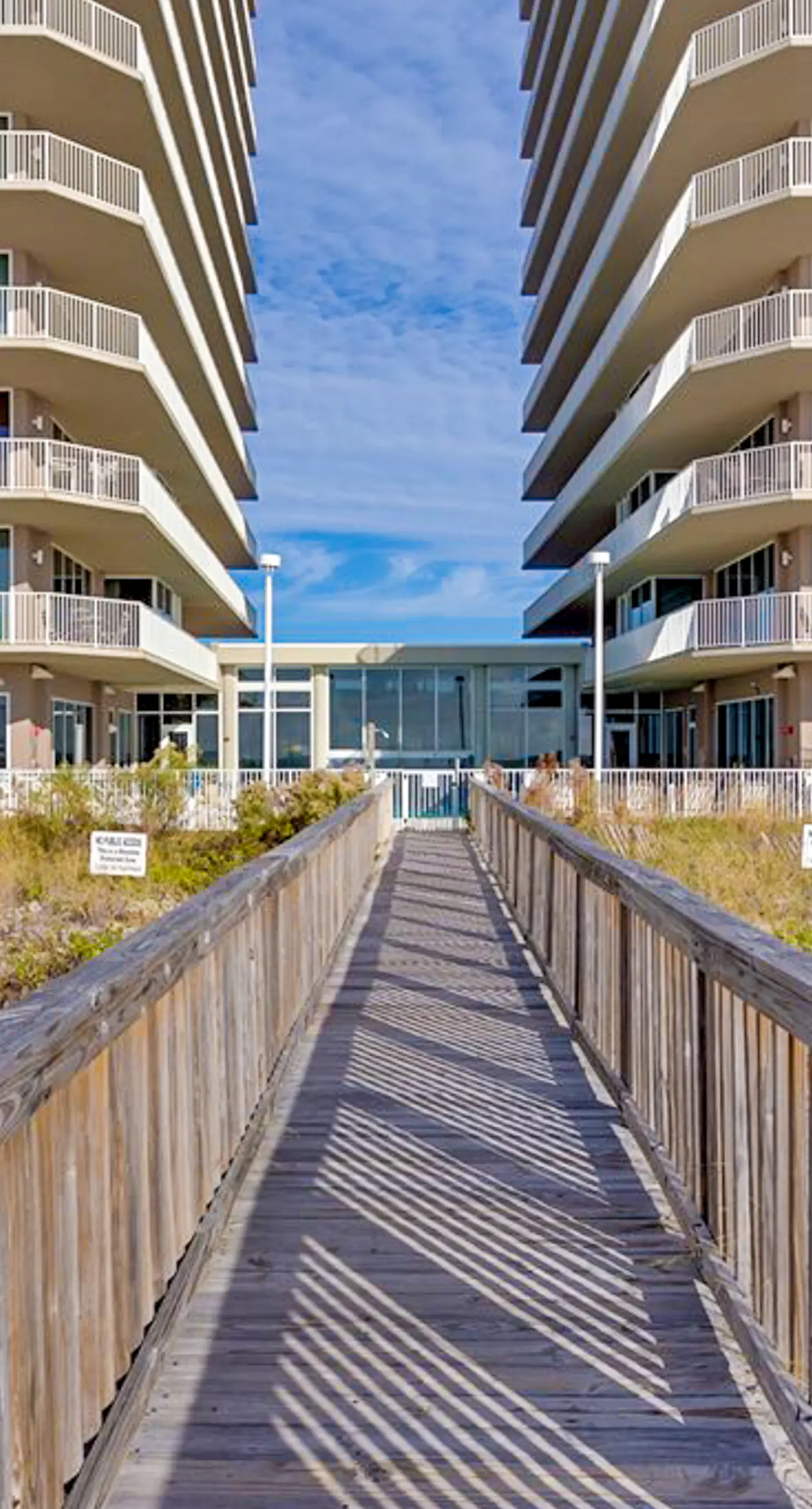Beachfront 10th-floor condo with Gulf view, pool, gym, & balcony