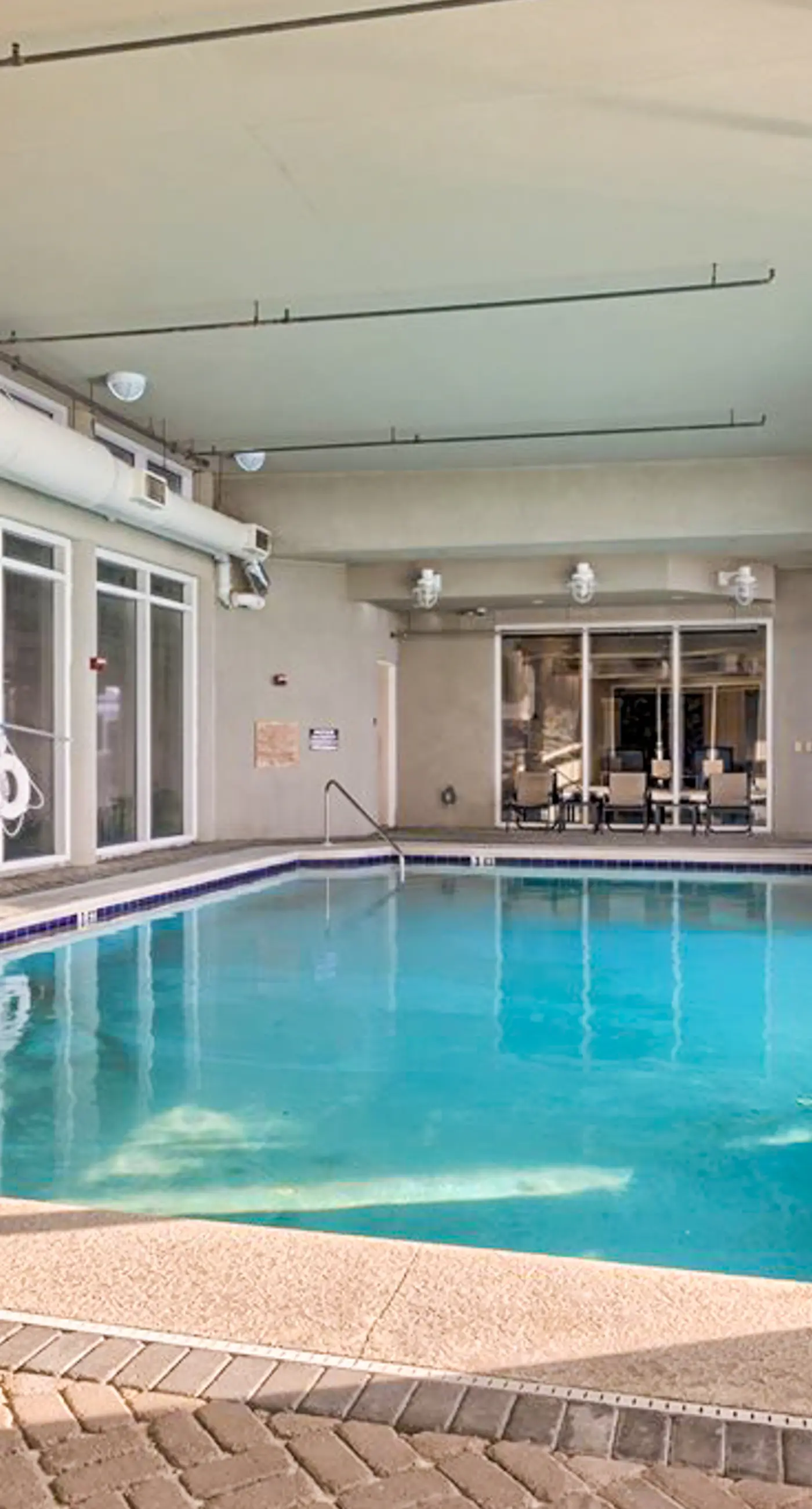 Beachfront 10th-floor condo with Gulf view, pool, gym, & balcony