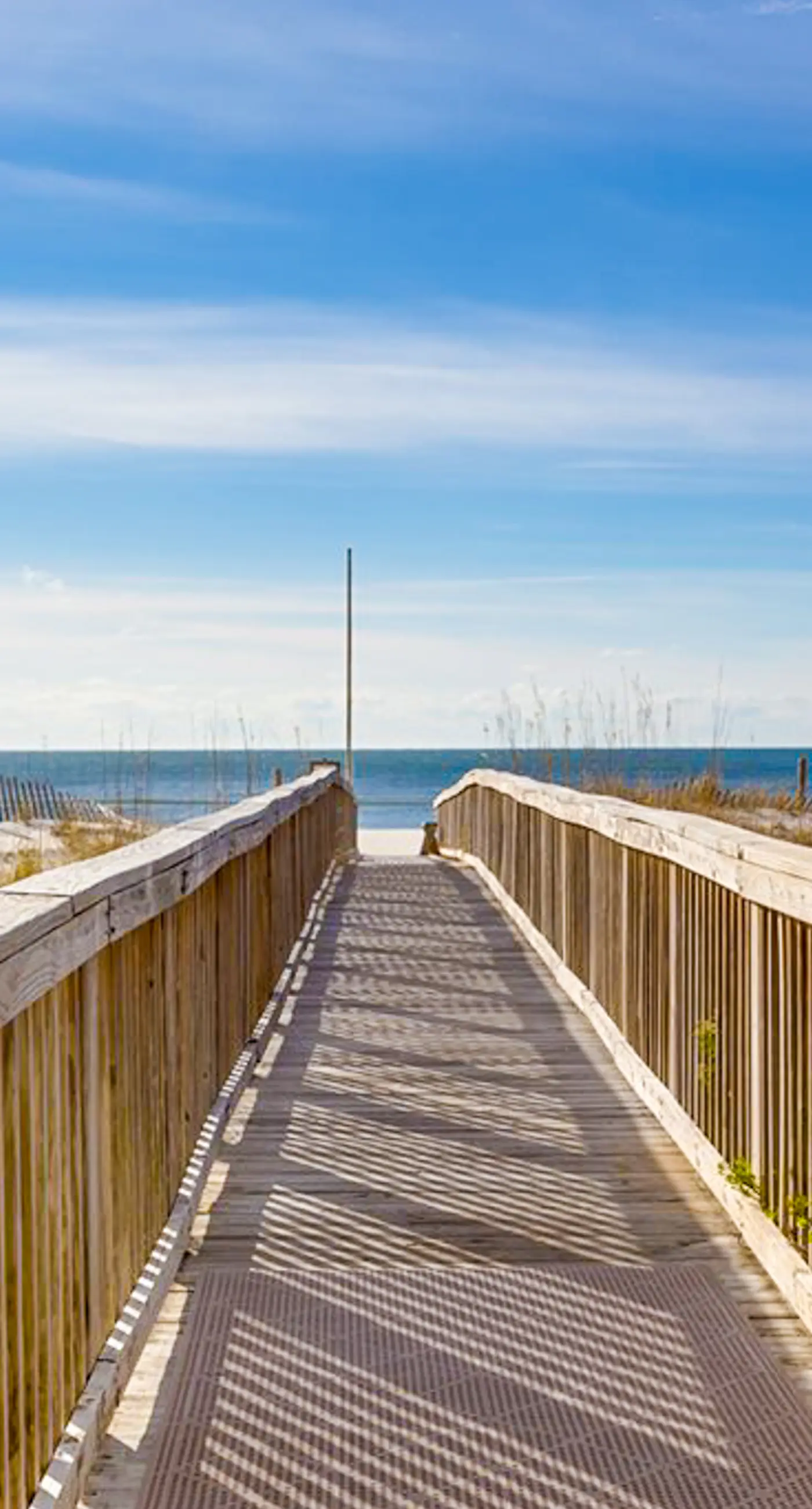 Beachfront 10th-floor condo with Gulf view, pool, gym, & balcony
