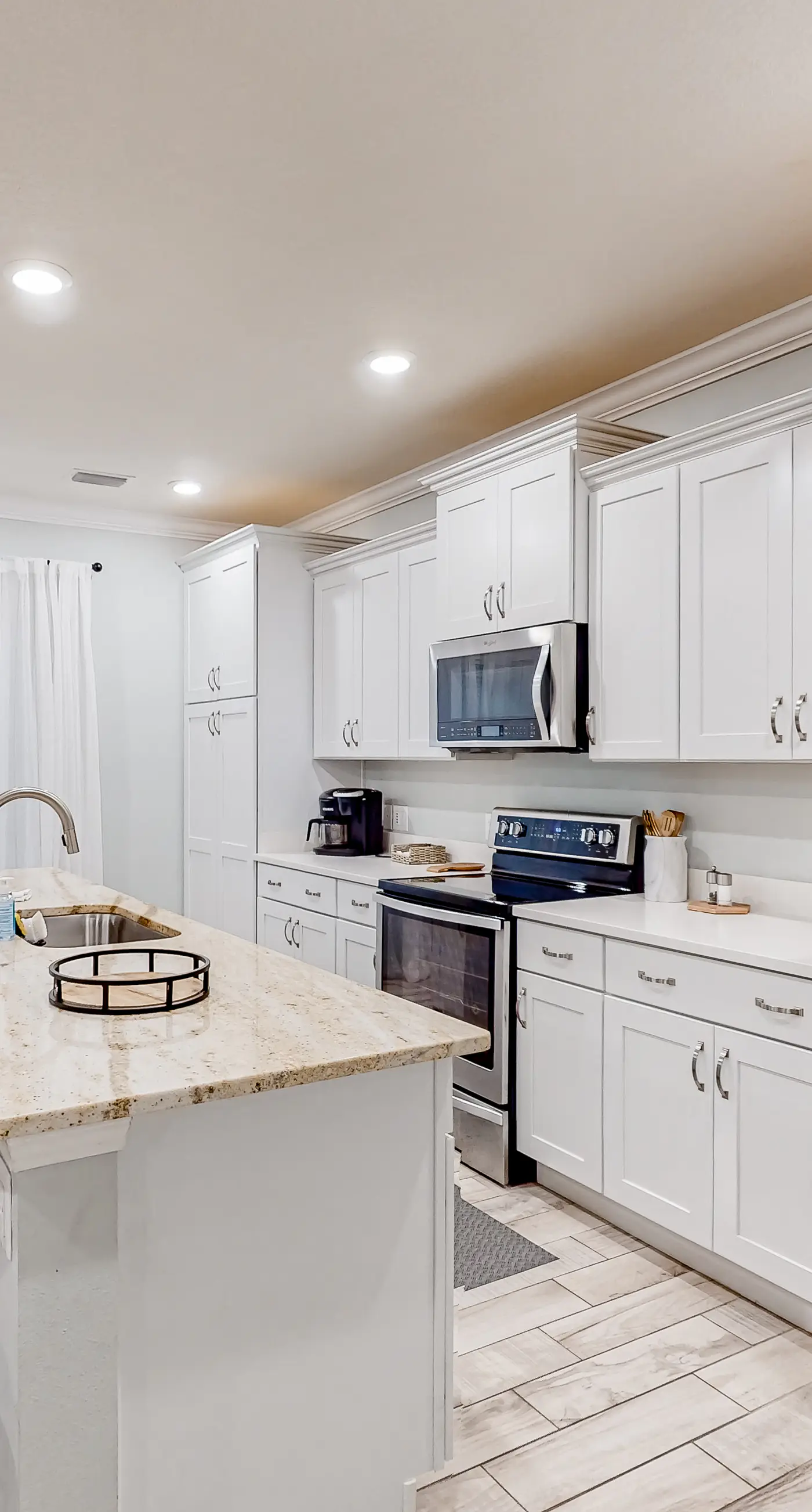 Beautiful & open home with enclosed porch, game room, W/D - beach & pool access