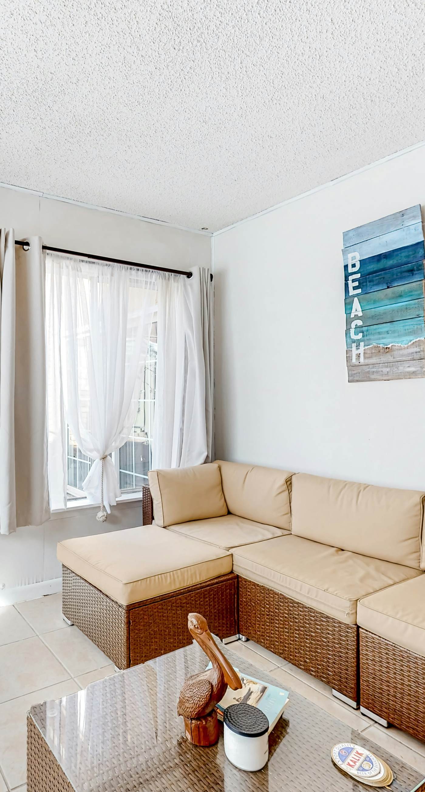 Dog-friendly coastal townhome with golf course views, patios, & washer/dryer