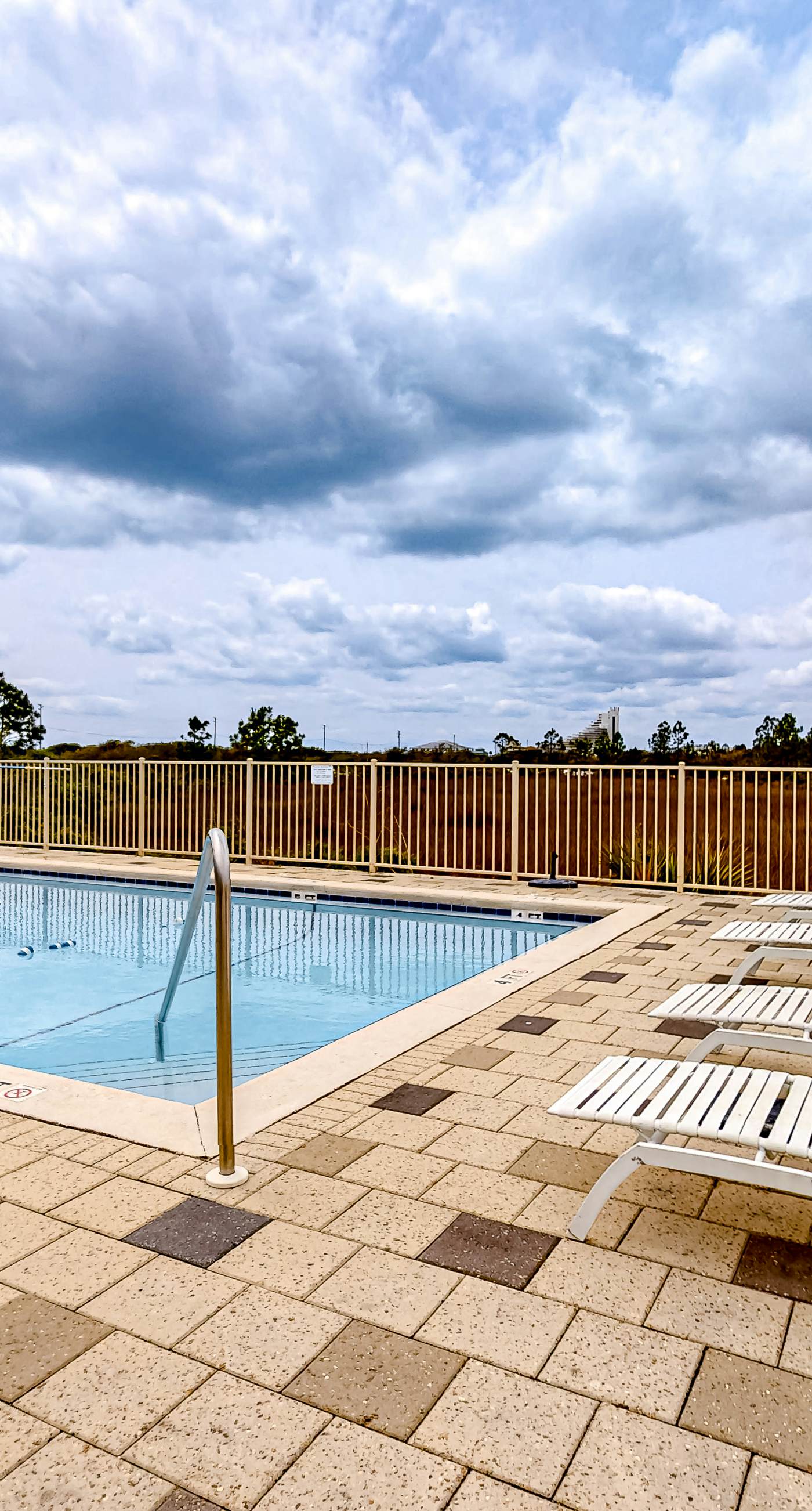 Inviting home with pool, Gulf view, tennis, patio, central AC, & W/D