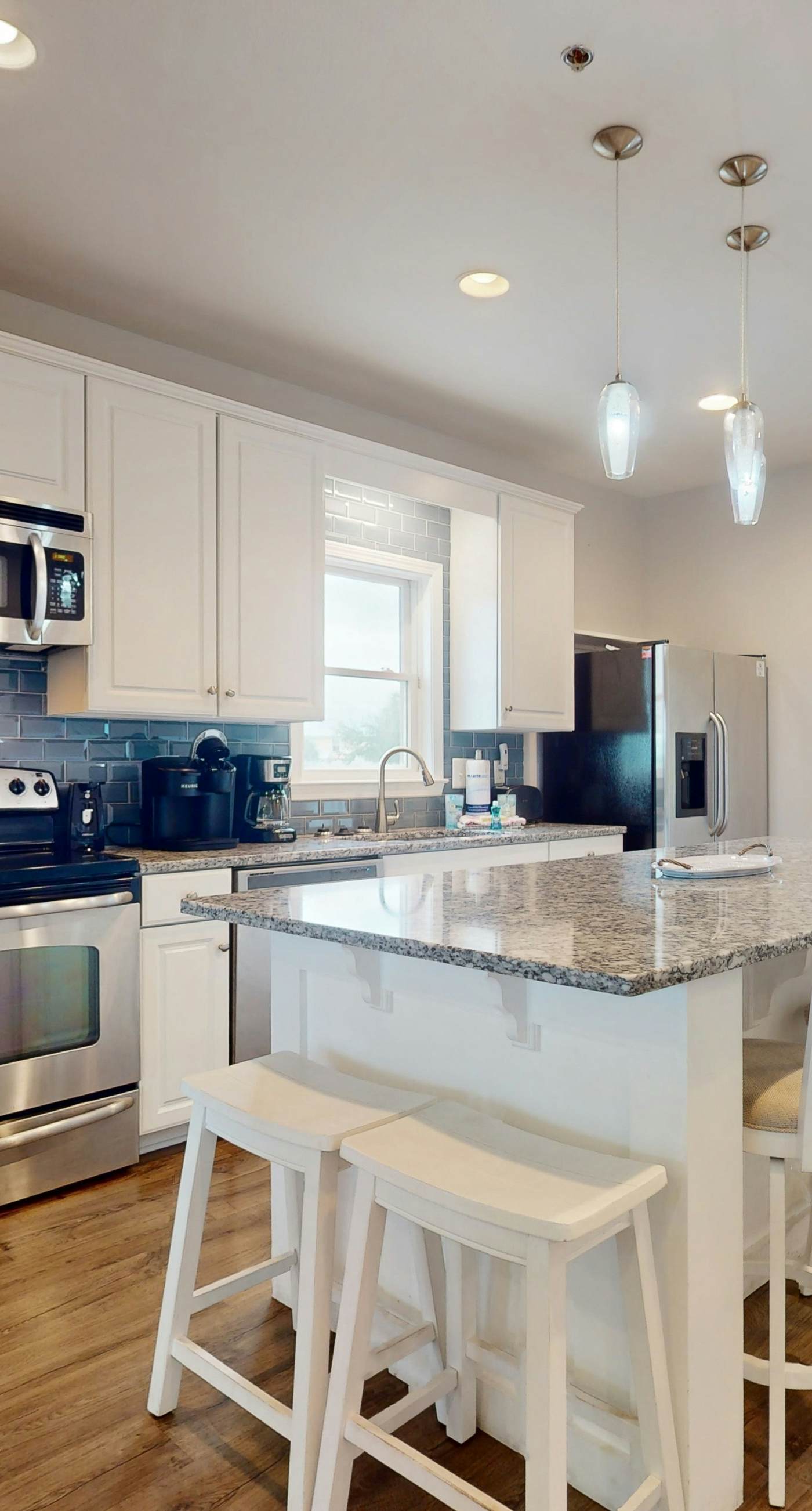 Inviting home with pool, Gulf view, tennis, patio, central AC, & W/D