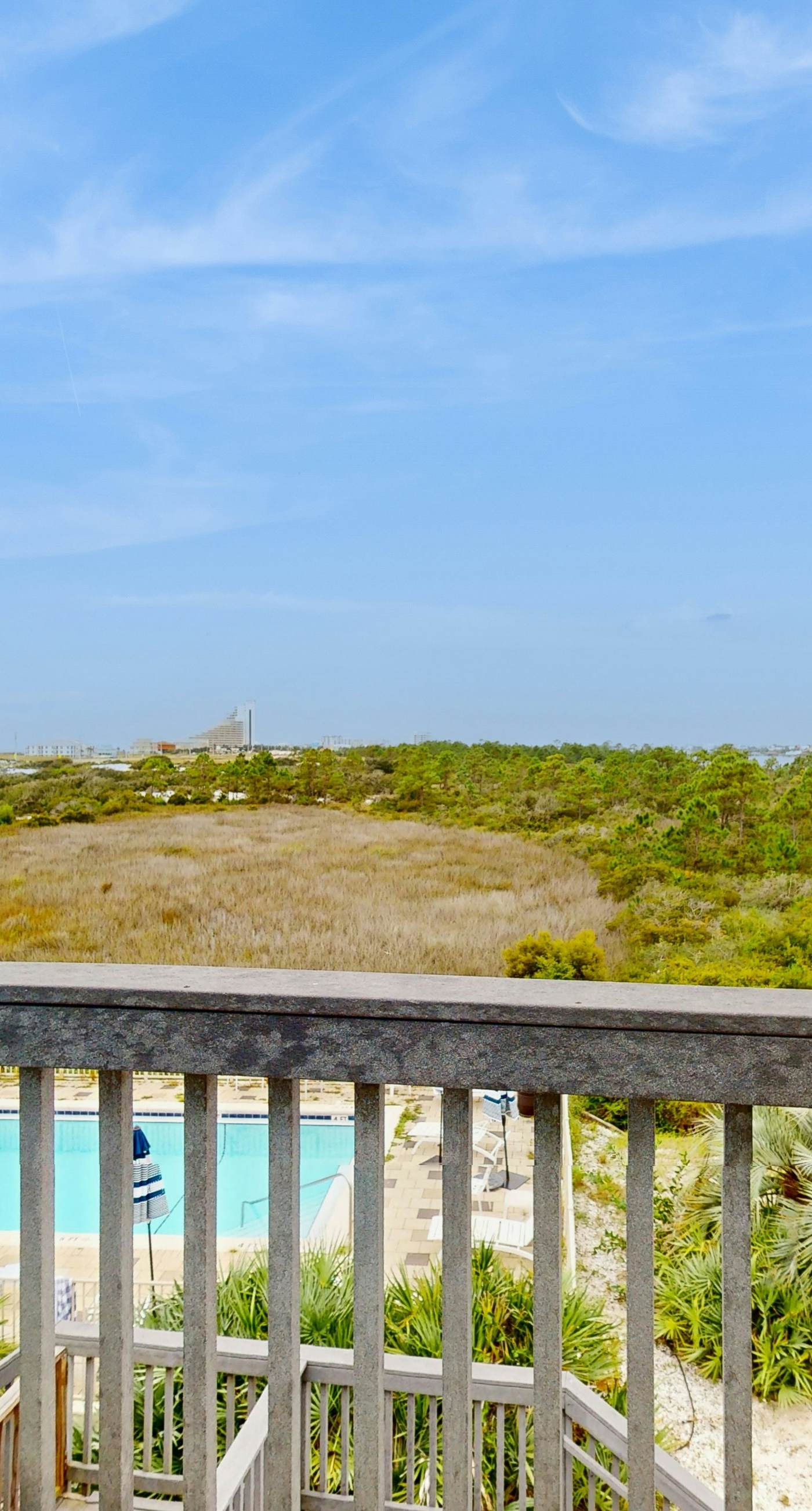 Inviting home with pool, Gulf view, tennis, patio, central AC, & W/D