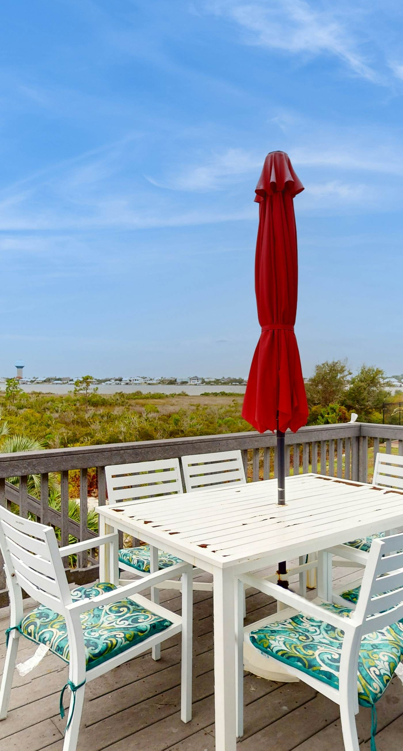 Inviting home with pool, Gulf view, tennis, patio, central AC, & W/D