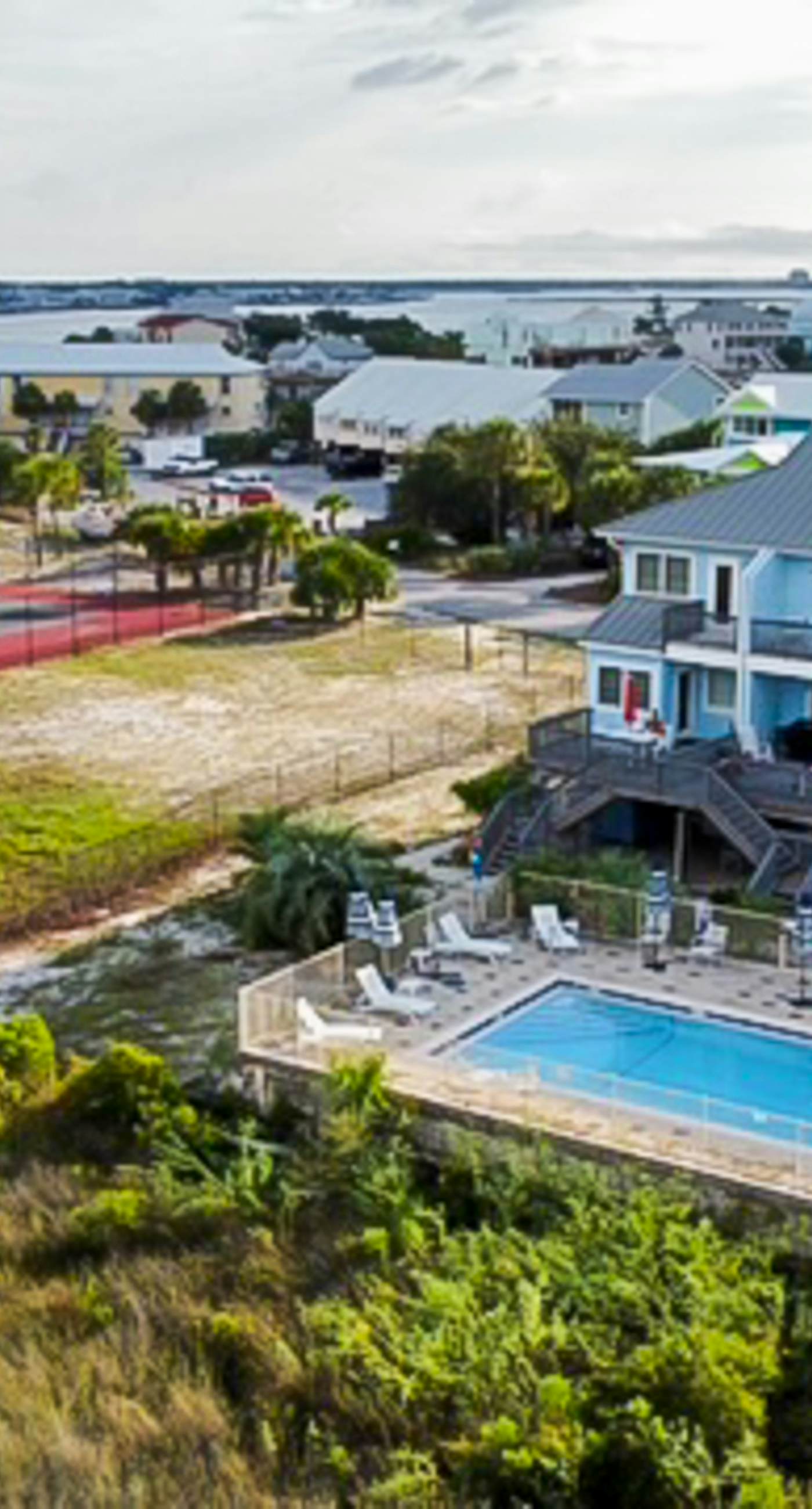 Inviting home with pool, Gulf view, tennis, patio, central AC, & W/D