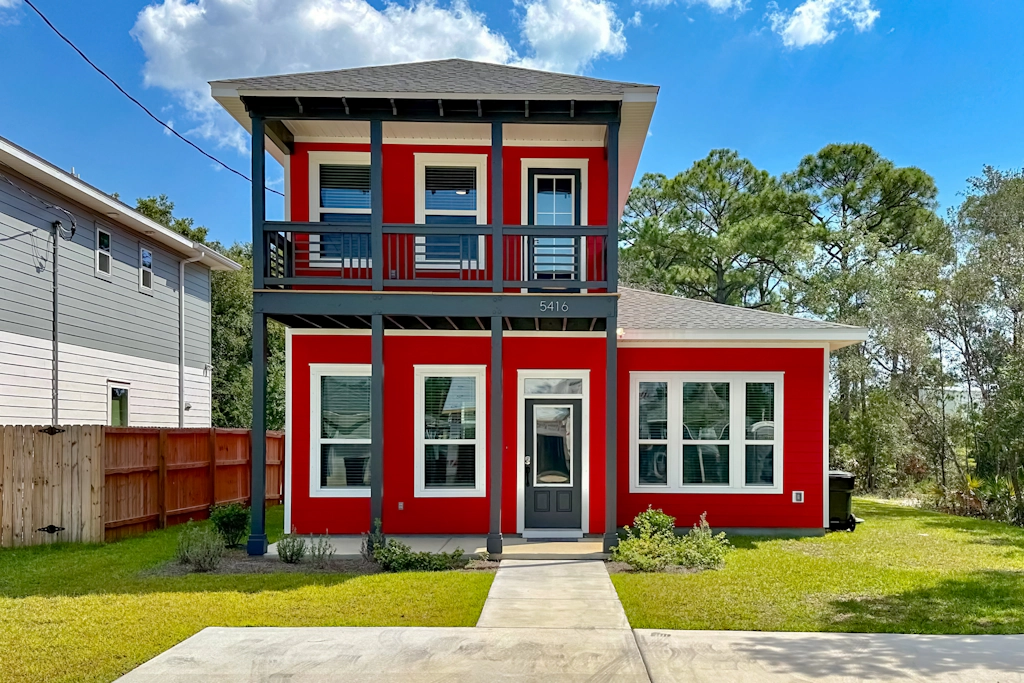 Modern home with large backyard, deck, and close to the beach