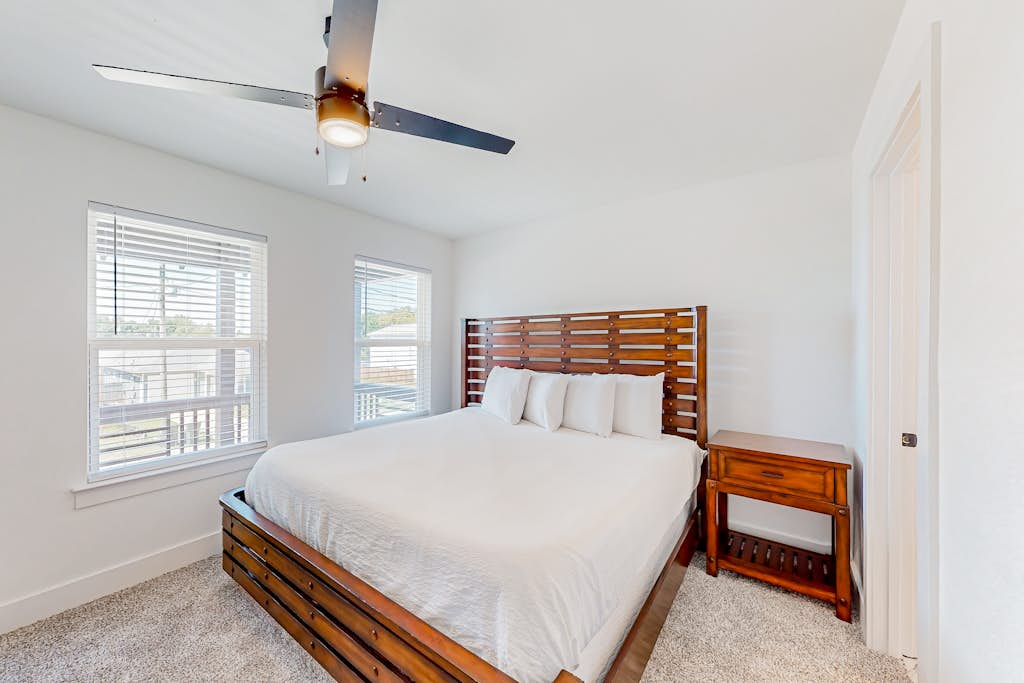 Modern home with large backyard, deck, and close to the beach