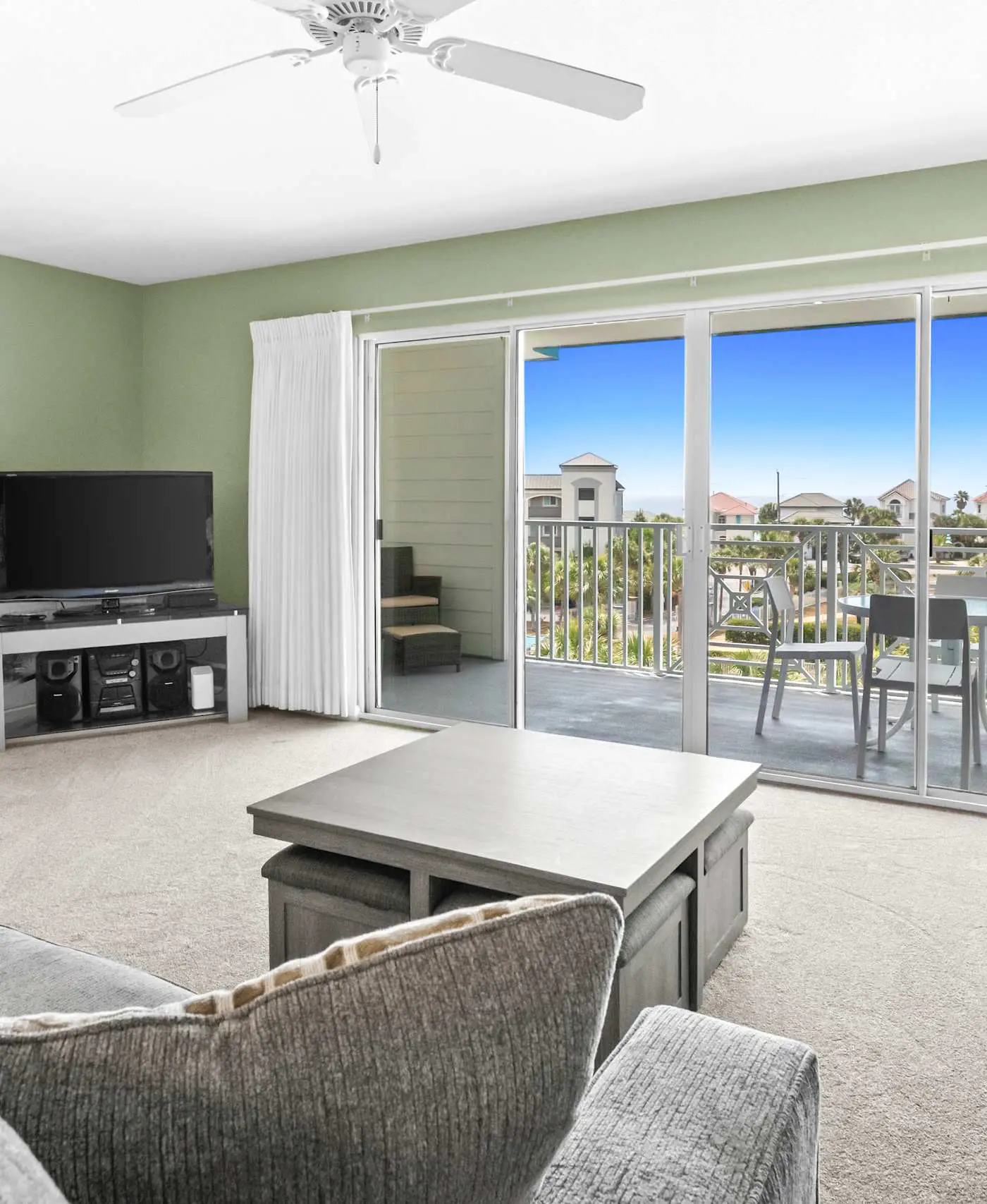 Fourth-floor, ocean-view condo with pool, high-speed WiFi, beach access & W&D