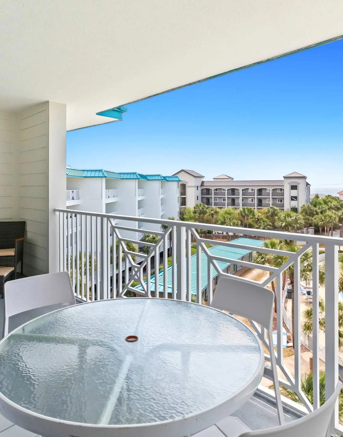 Fourth-floor, ocean-view condo with pool, high-speed WiFi, beach access & W&D