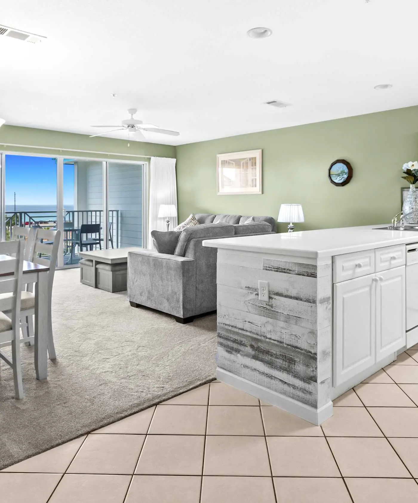 Fourth-floor, ocean-view condo with pool, high-speed WiFi, beach access & W&D