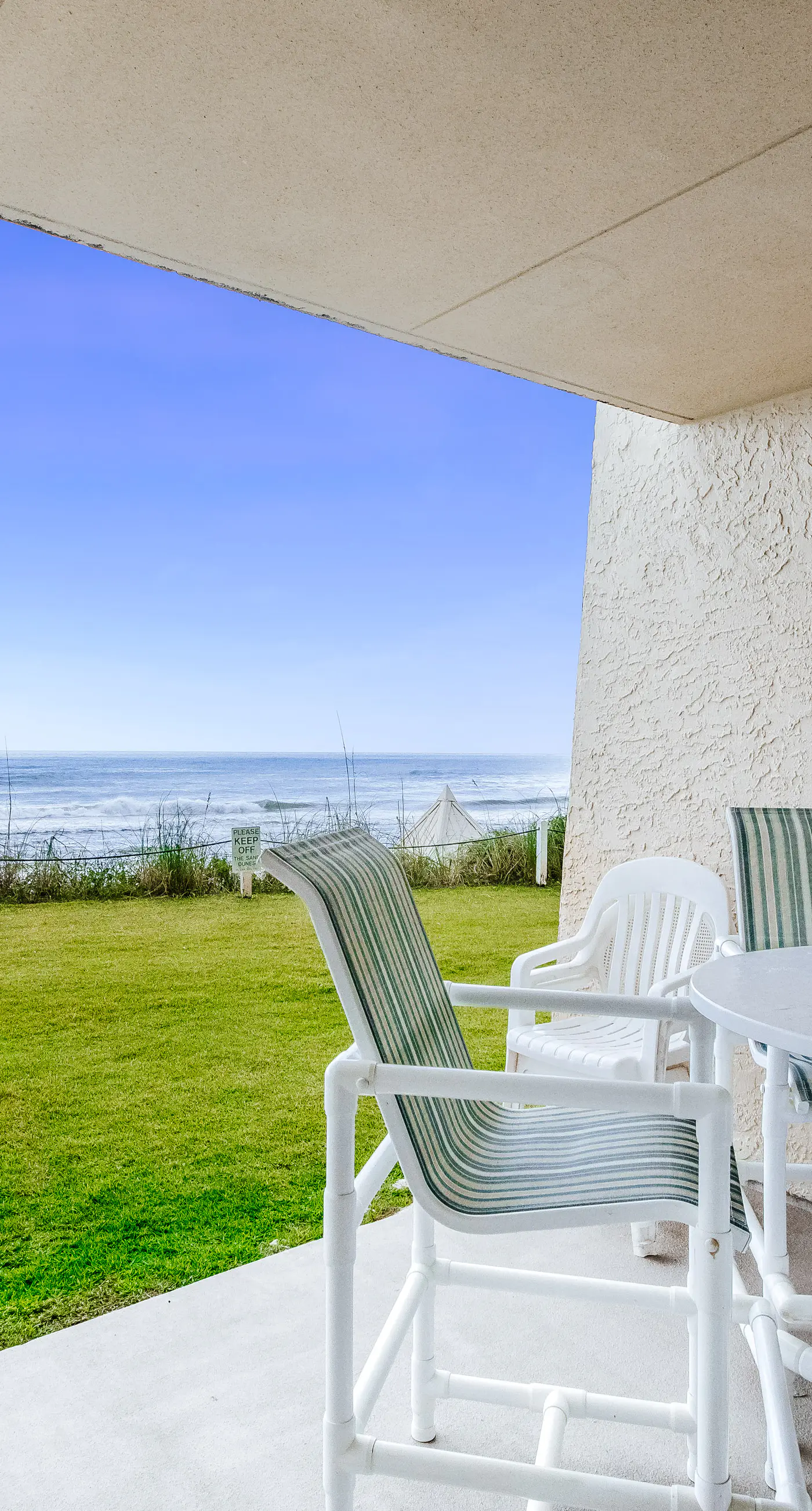 Beachfront ground-floor condo with beach & Gulf views, outdoor pool & tennis