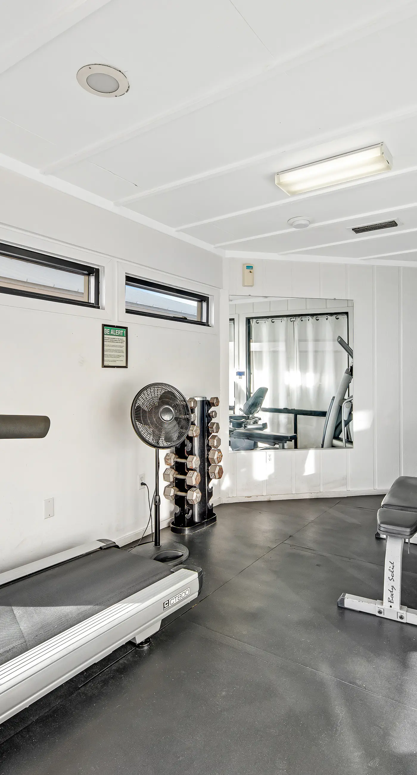 Ground floor oceanfront beachy condo with furnished patio, outdoor pool, gym