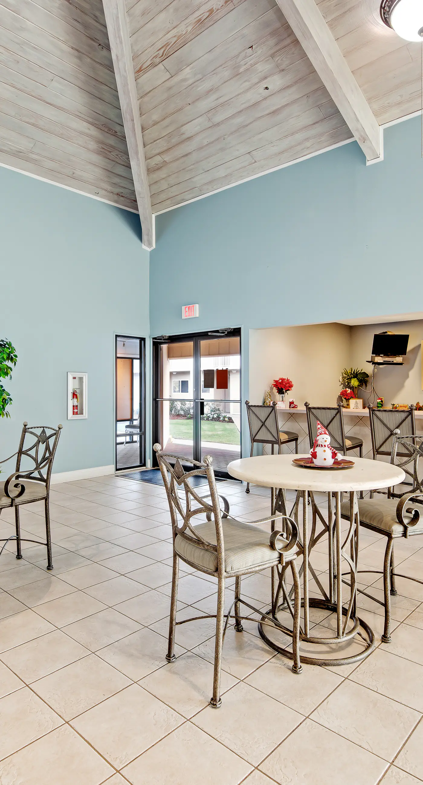 Ground floor oceanfront beachy condo with furnished patio, outdoor pool, gym