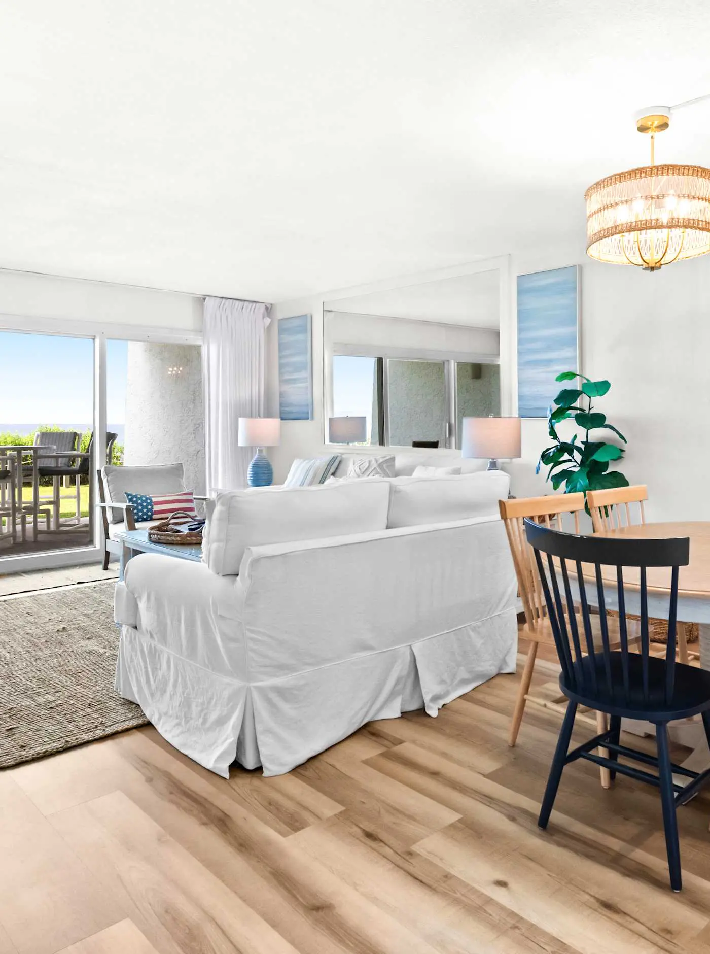 Ground floor oceanfront beachy condo with furnished patio, outdoor pool, gym