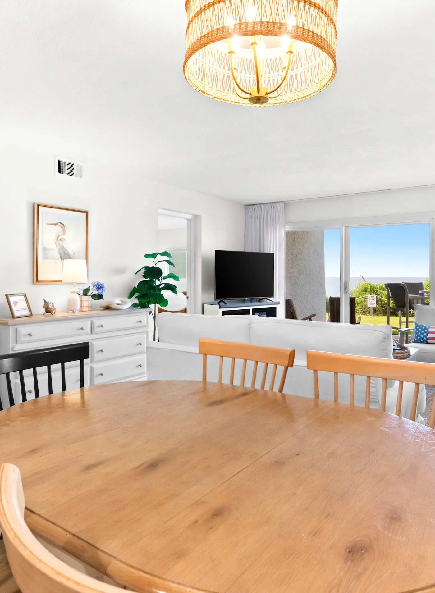 Ground floor oceanfront beachy condo with furnished patio, outdoor pool, gym