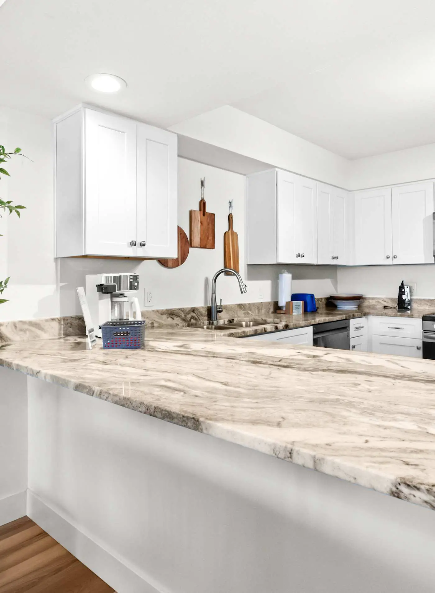 Ground floor oceanfront beachy condo with furnished patio, outdoor pool, gym