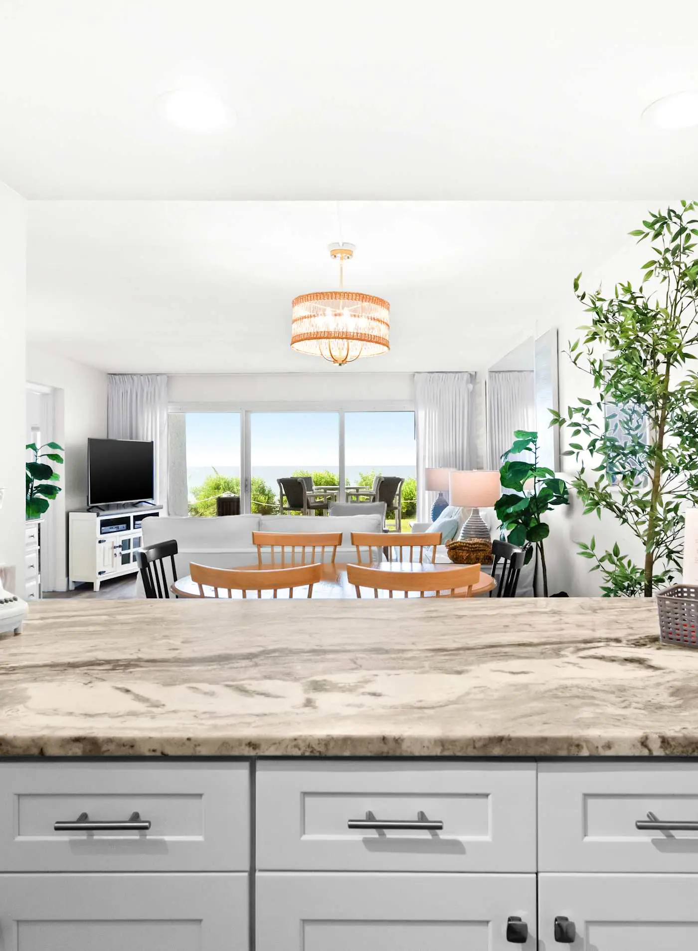 Ground floor oceanfront beachy condo with furnished patio, outdoor pool, gym