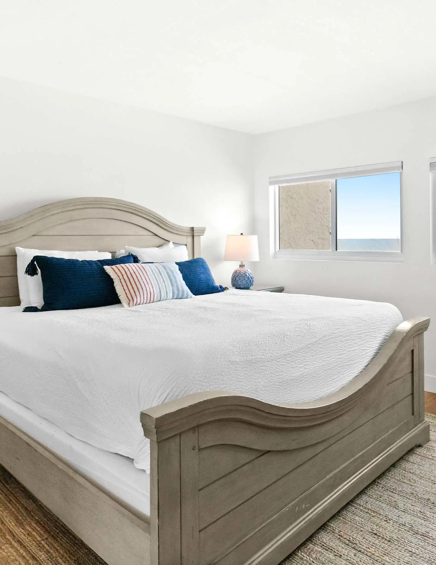Ground floor oceanfront beachy condo with furnished patio, outdoor pool, gym