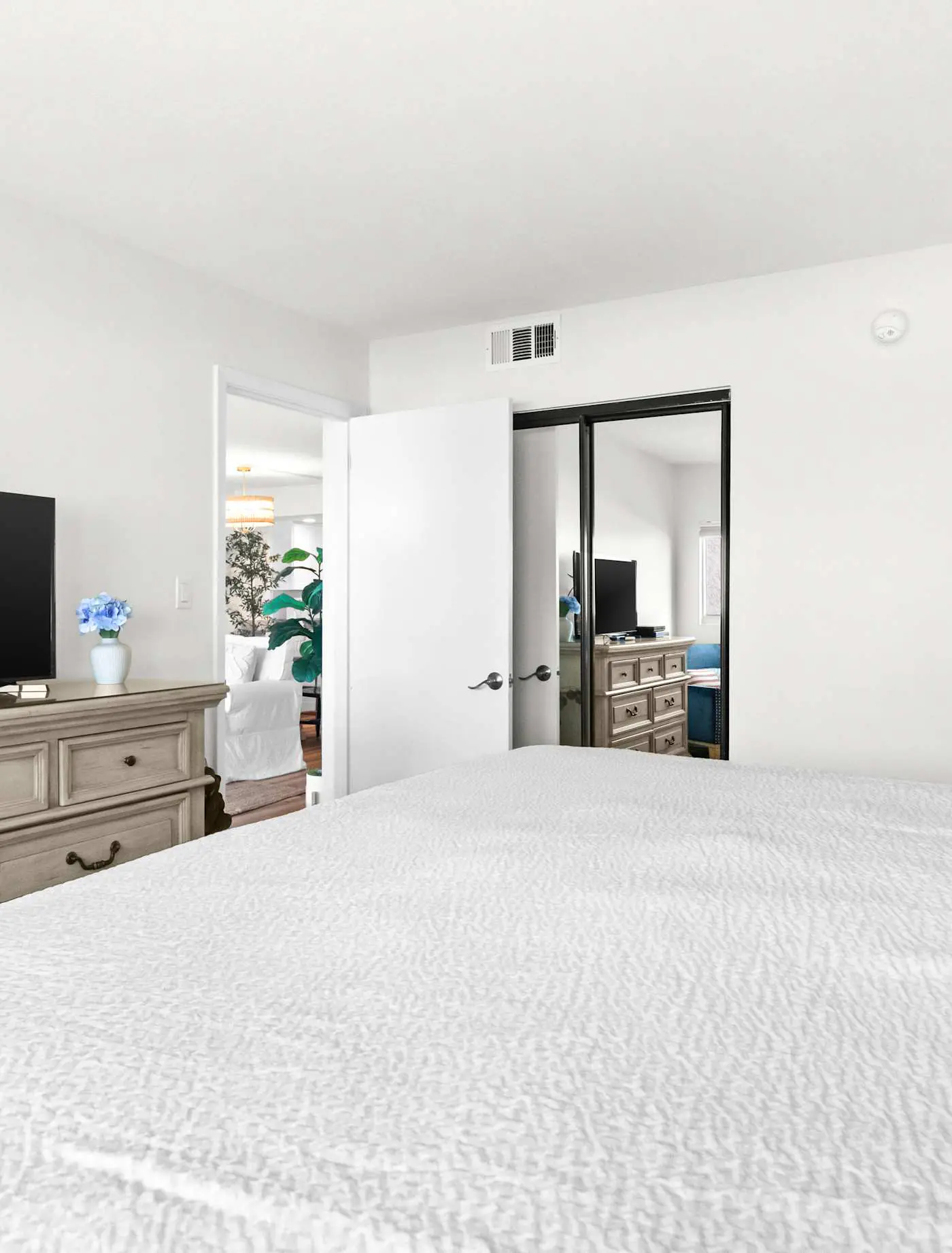 Ground floor oceanfront beachy condo with furnished patio, outdoor pool, gym