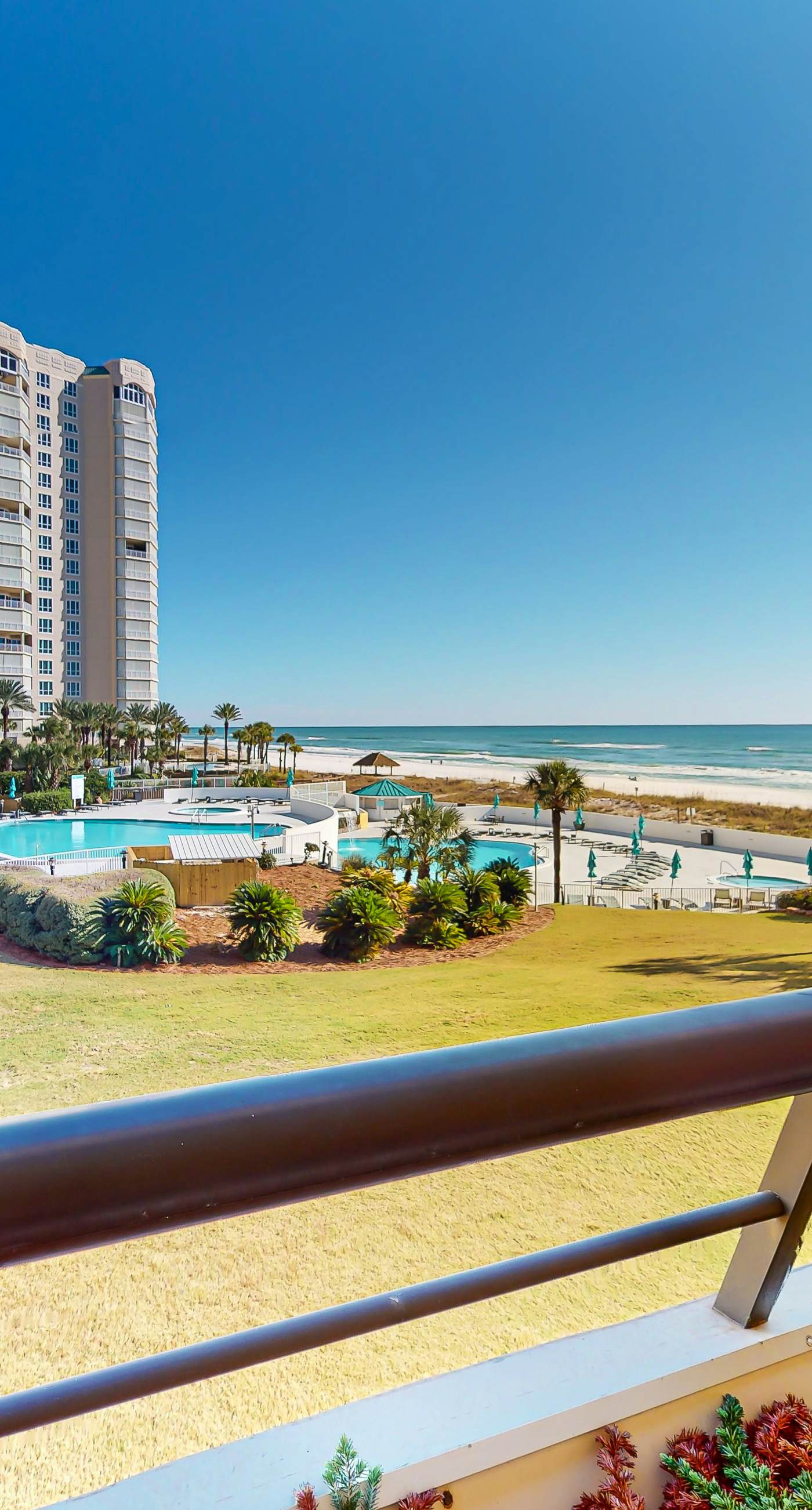 Oceanfront gem with pool, gym, hot tub, AC, W&D & beach-view balcony