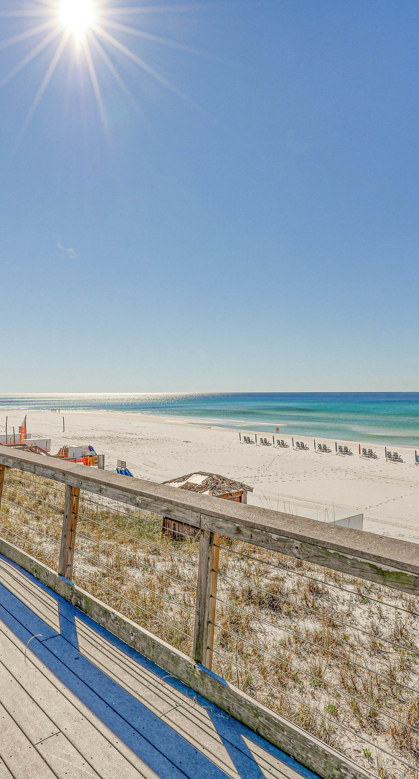 Oceanfront gem with pool, gym, hot tub, AC, W&D & beach-view balcony