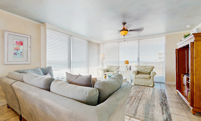 Spacious beachfront condo with full kitchen, shared pool and beach access