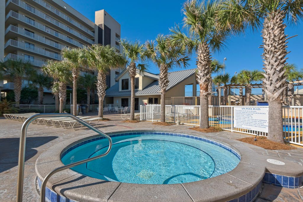 Spacious beachfront condo with full kitchen, shared pool and beach access