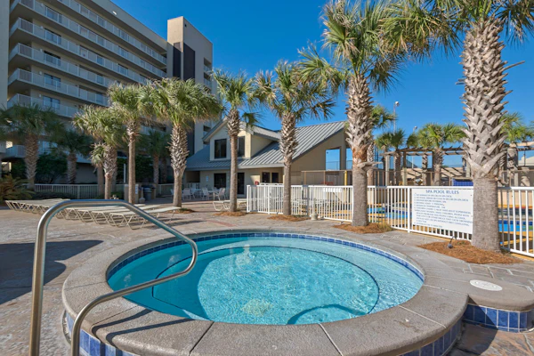 Spacious beachfront condo with full kitchen, shared pool and beach access