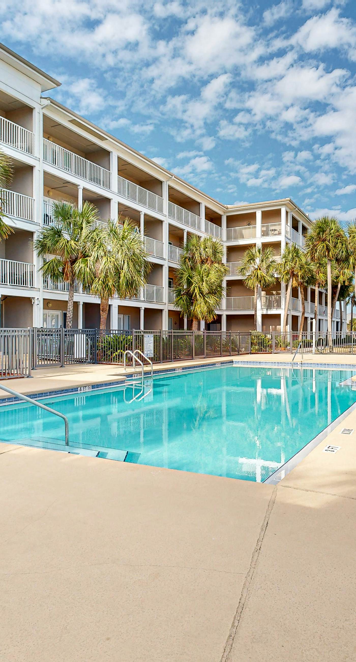 Sunny condo with pool, hot tub, pool views, balcony, & AC