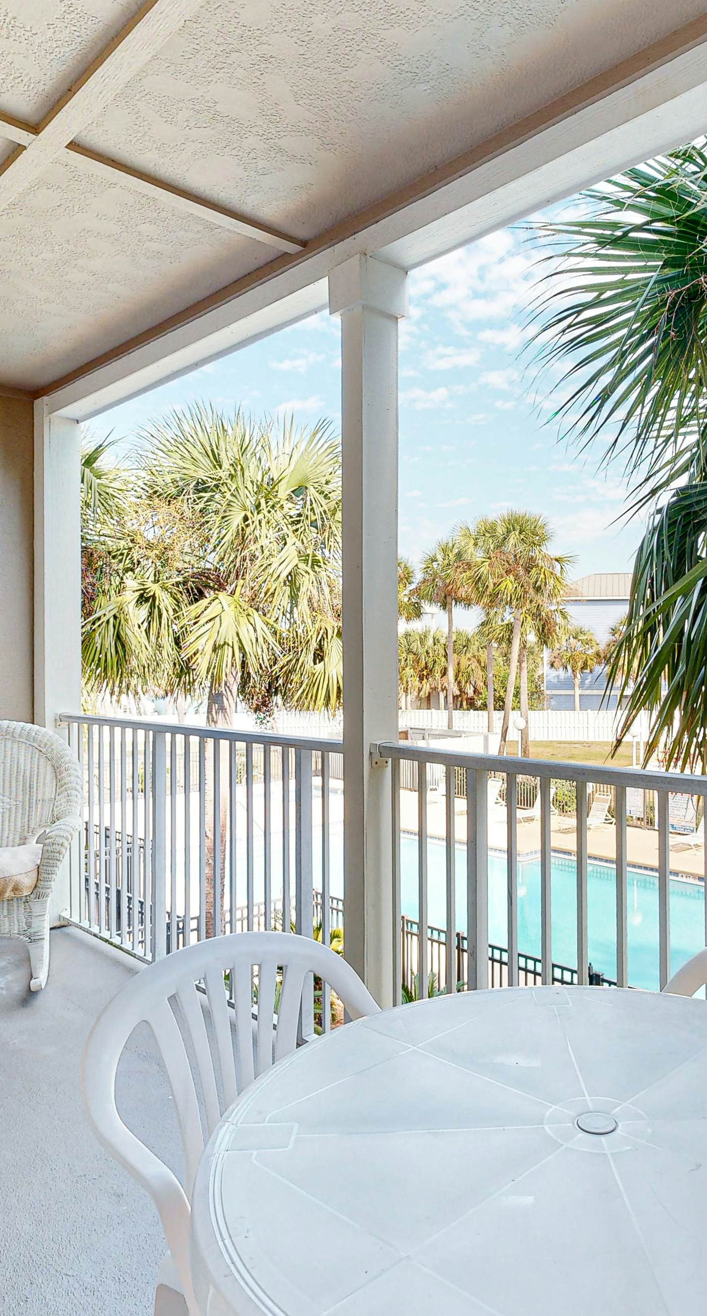 Sunny condo with pool, hot tub, pool views, balcony, & AC