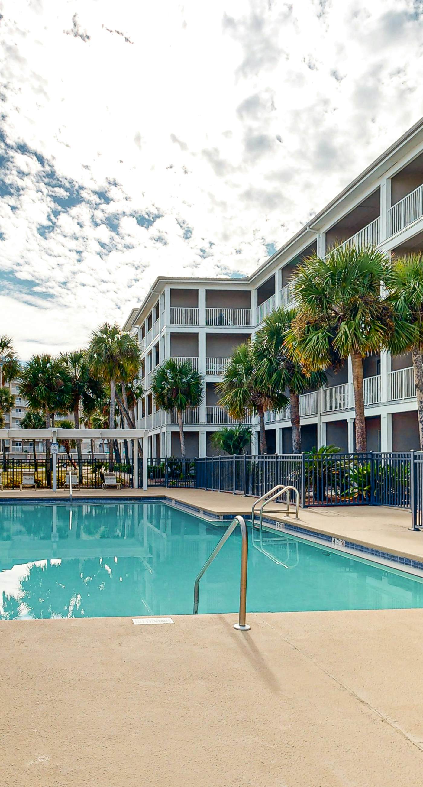 Sunny condo with pool, hot tub, pool views, balcony, & AC