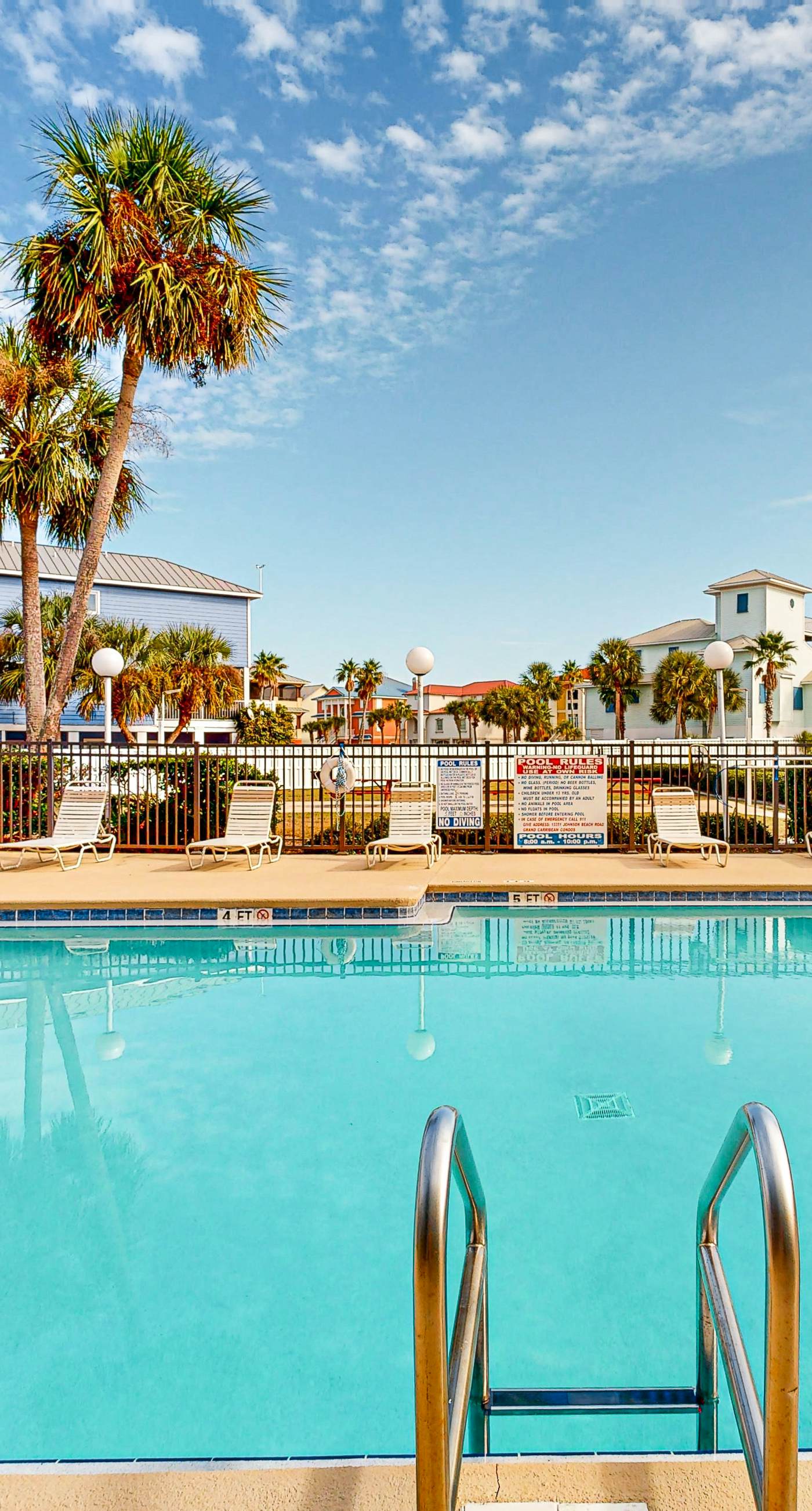 Sunny condo with pool, hot tub, pool views, balcony, & AC