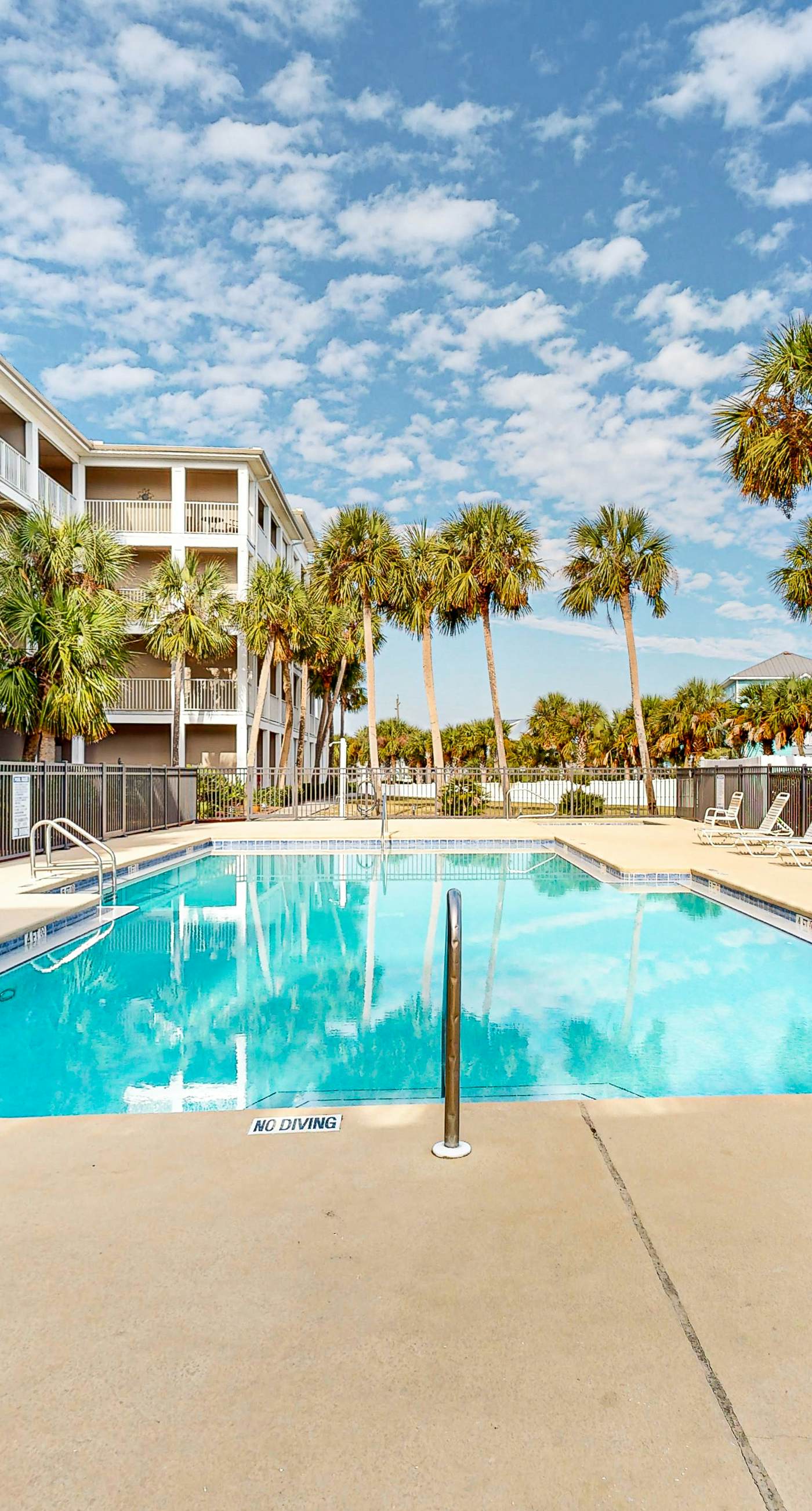 Sunny condo with pool, hot tub, pool views, balcony, & AC