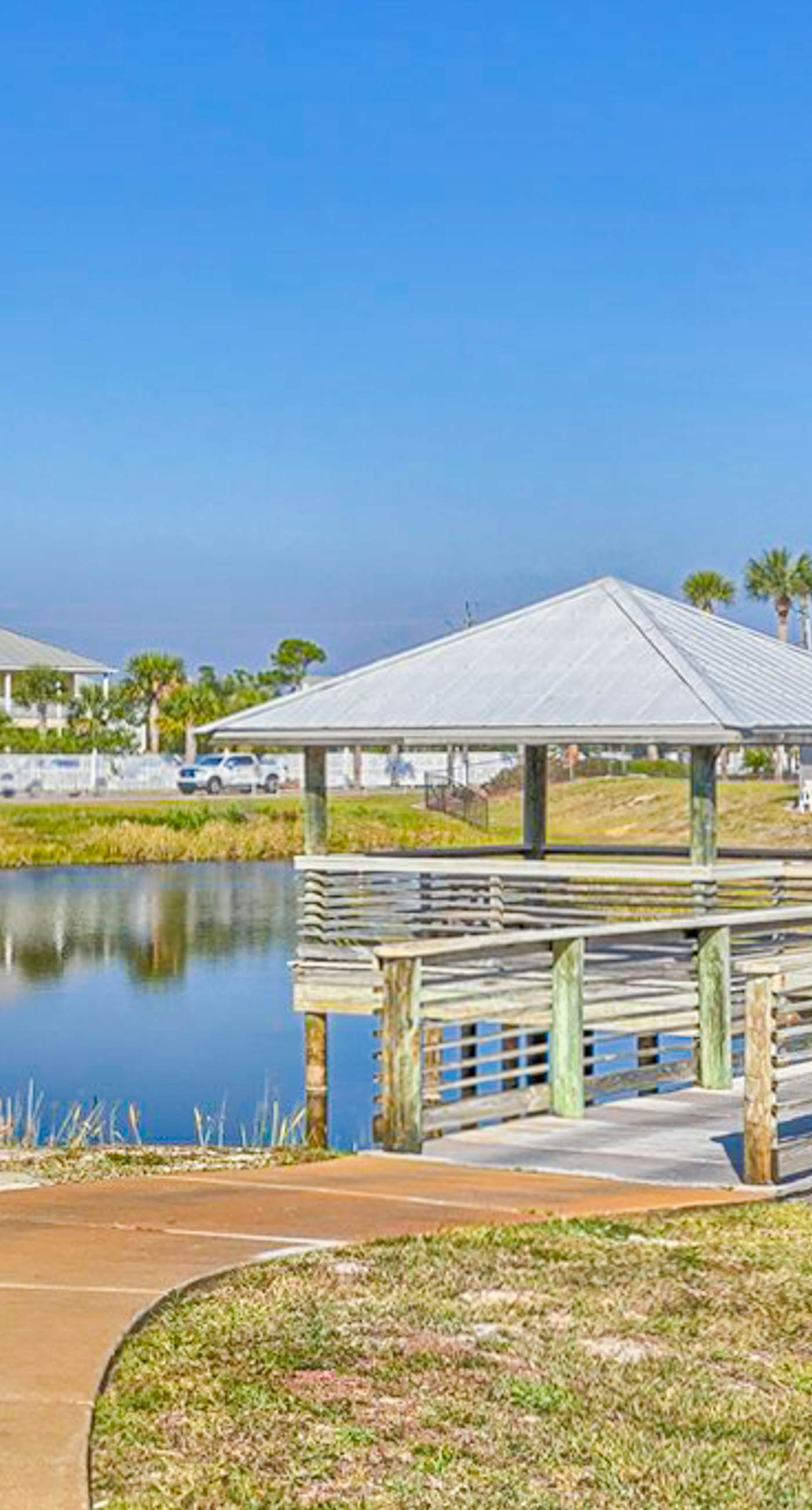 Sunny condo with pool, hot tub, pool views, balcony, & AC