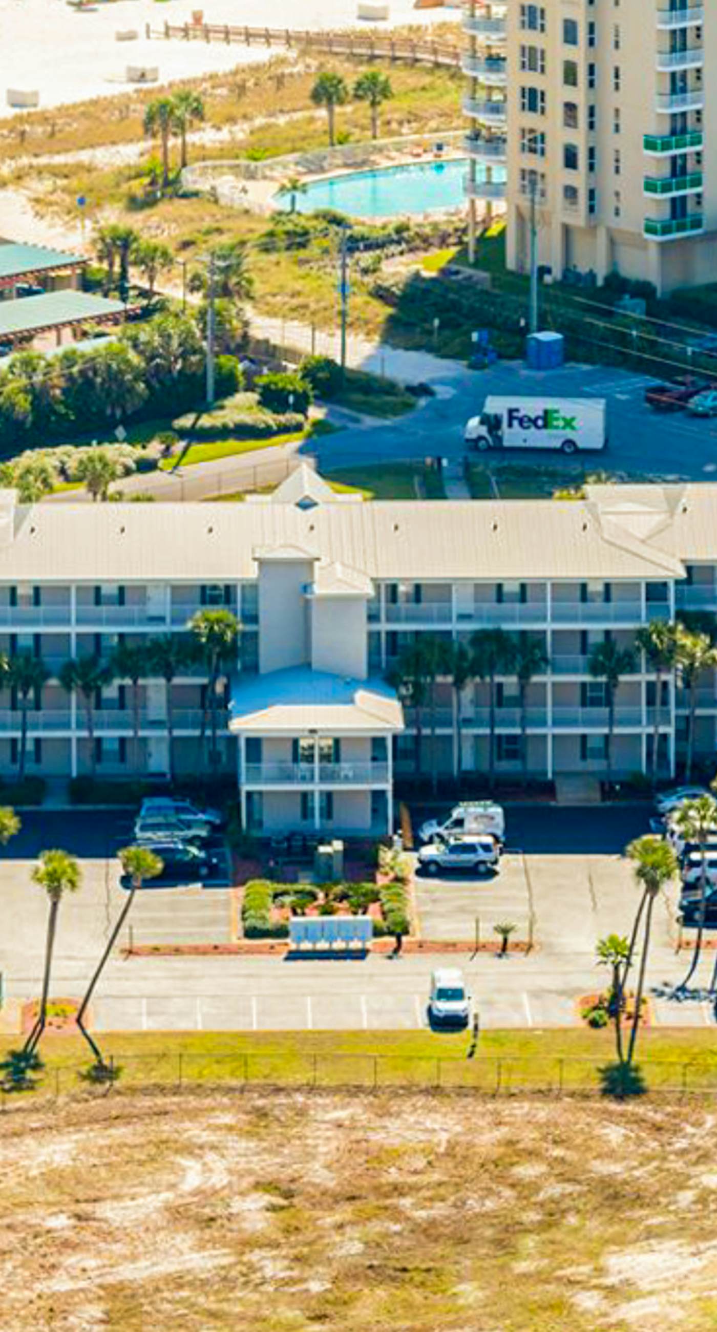 Sunny condo with pool, hot tub, pool views, balcony, & AC