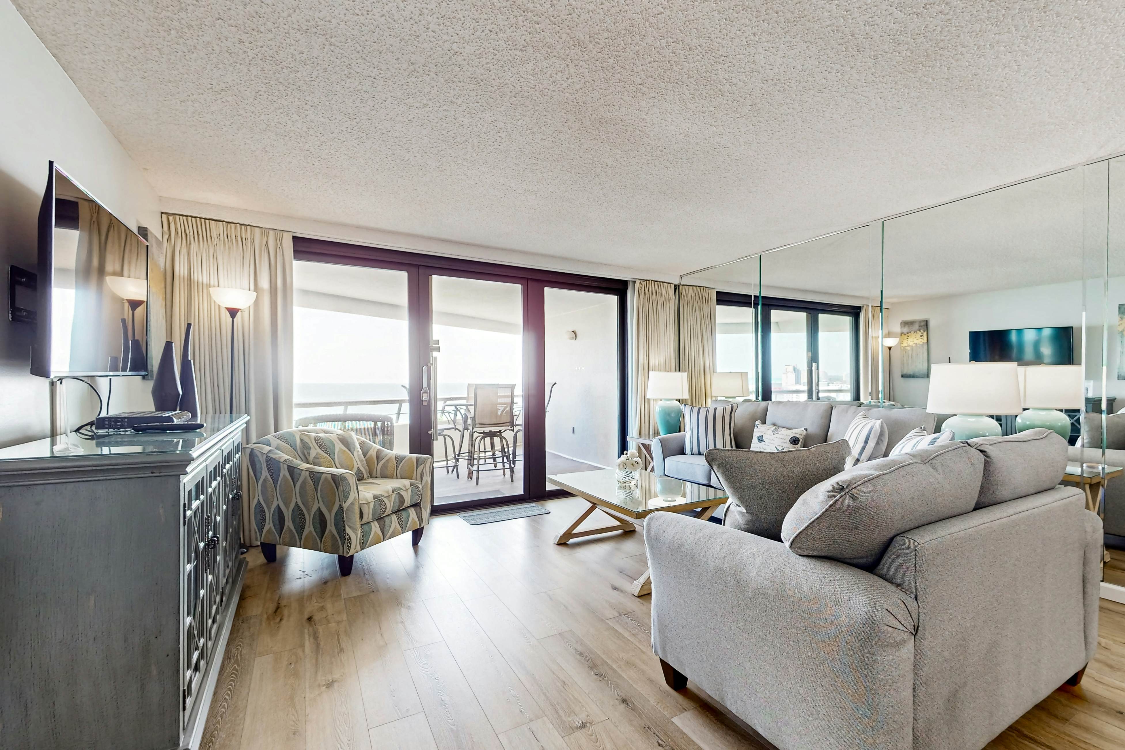 Gorgeious beachview condo with large balcony & shared pool