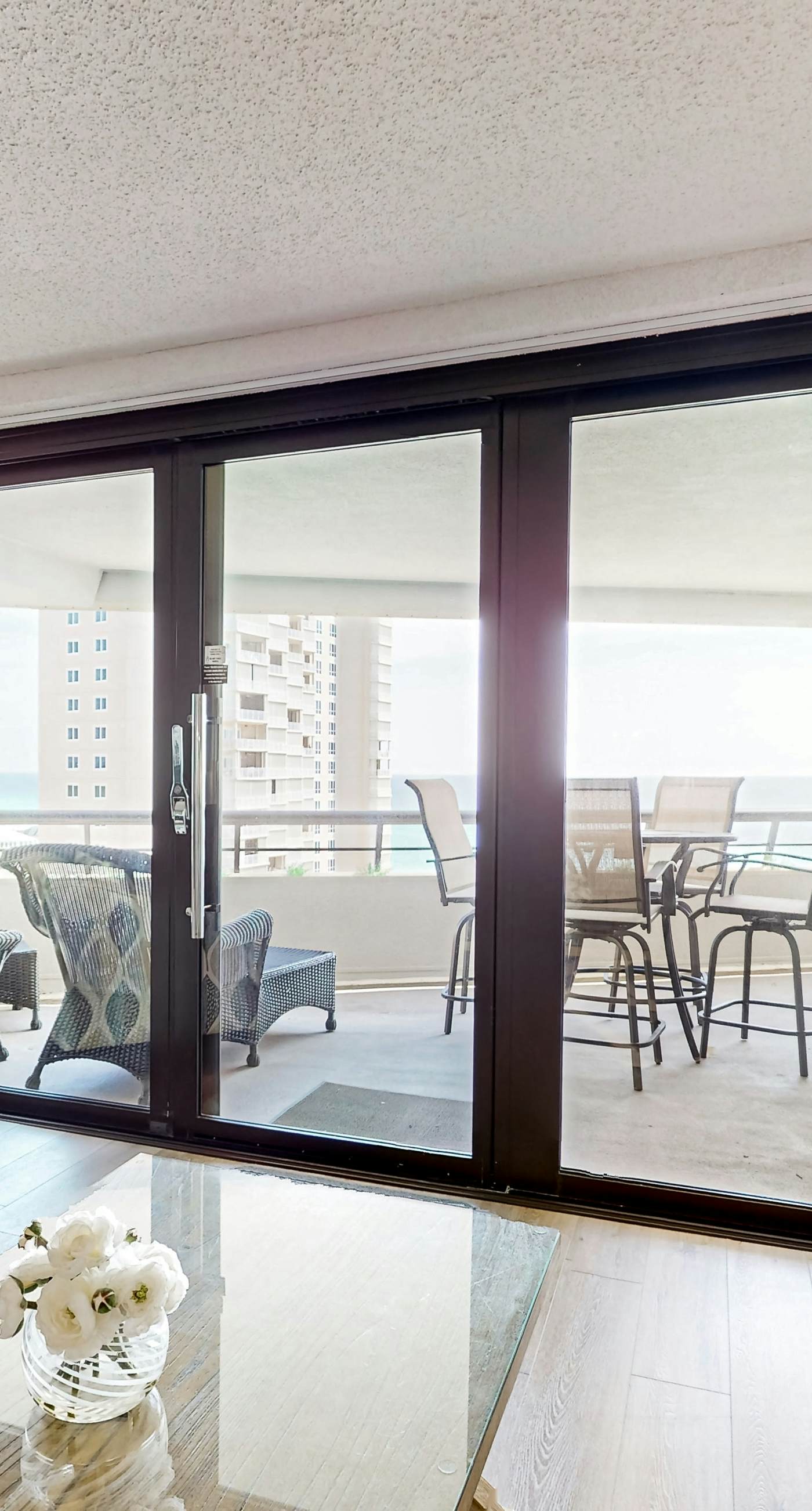 Gorgeious beachview condo with large balcony & shared pool