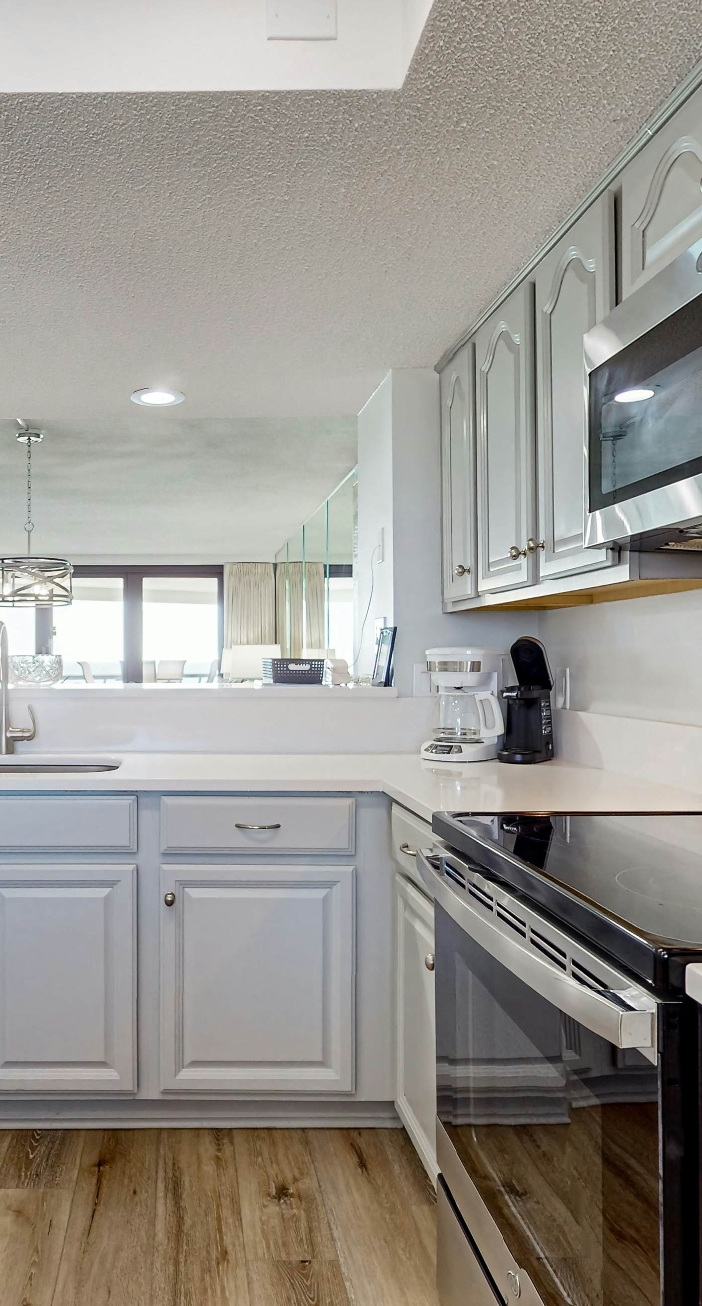 Gorgeious beachview condo with large balcony & shared pool