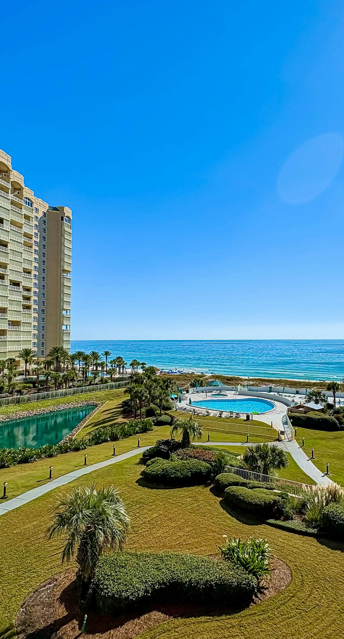 Gorgeous coastal condo with shared pool and easy beach access