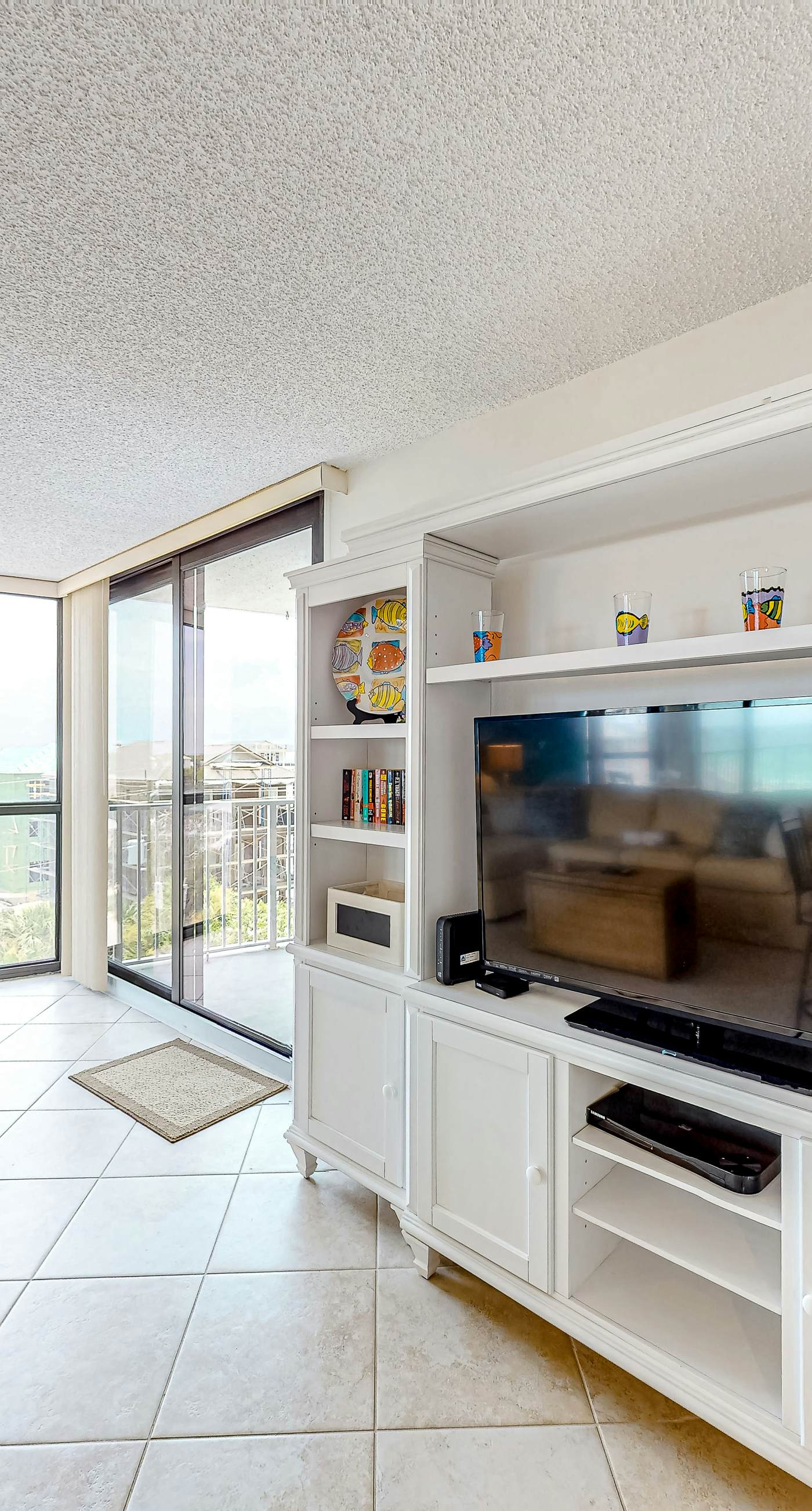 Gulf-view condo with balcony, pools, hot tub, beach access, & sports courts