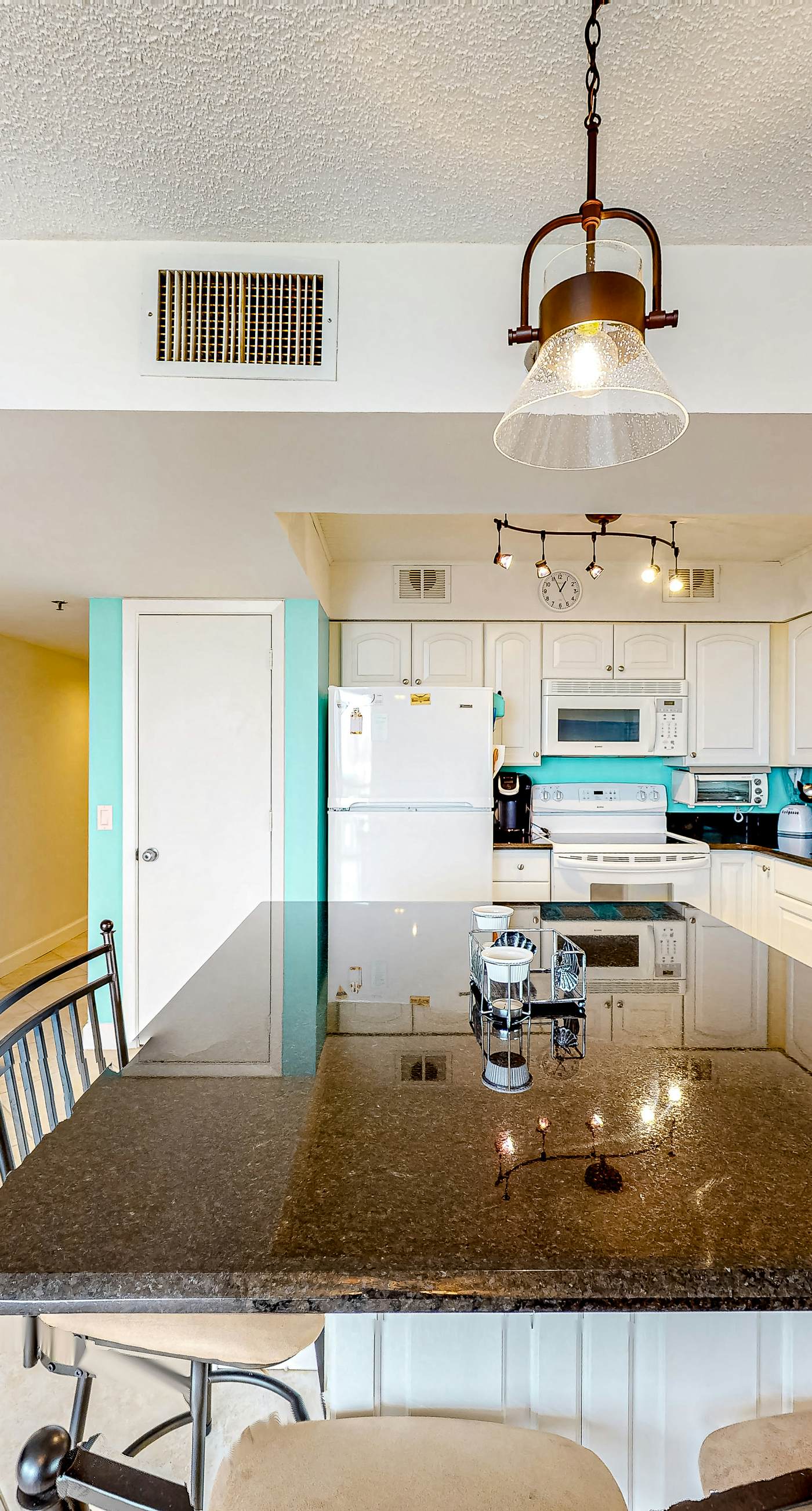 Gulf-view condo with balcony, pools, hot tub, beach access, & sports courts