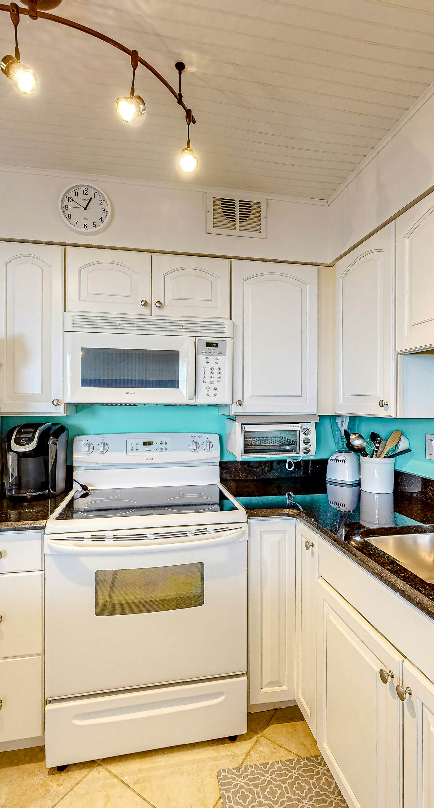 Gulf-view condo with balcony, pools, hot tub, beach access, & sports courts