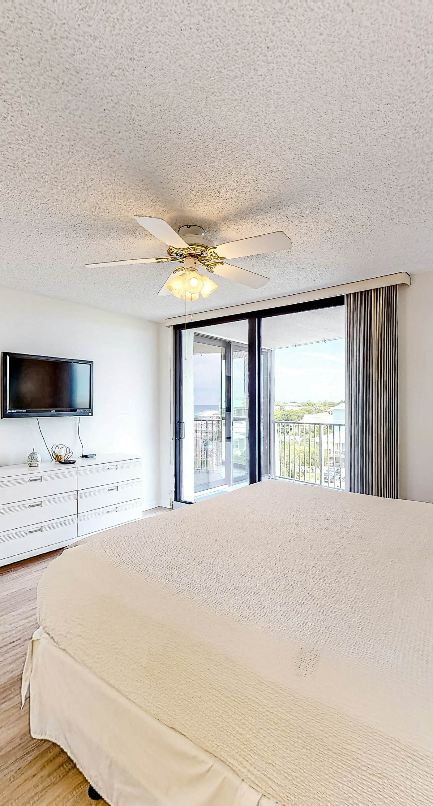 Gulf-view condo with balcony, pools, hot tub, beach access, & sports courts