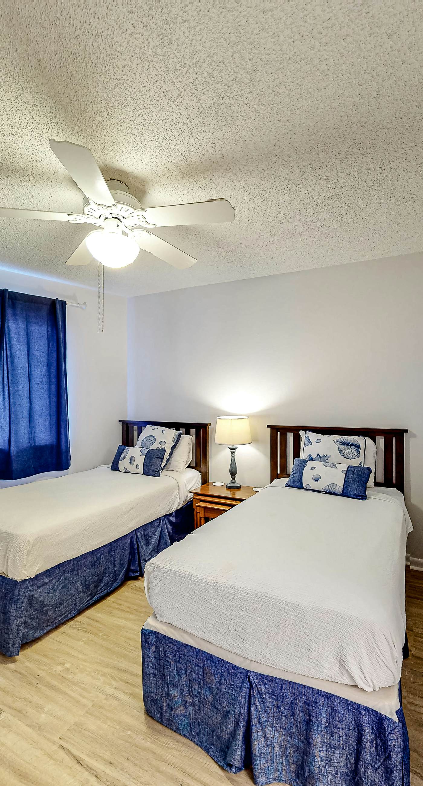 Gulf-view condo with balcony, pools, hot tub, beach access, & sports courts